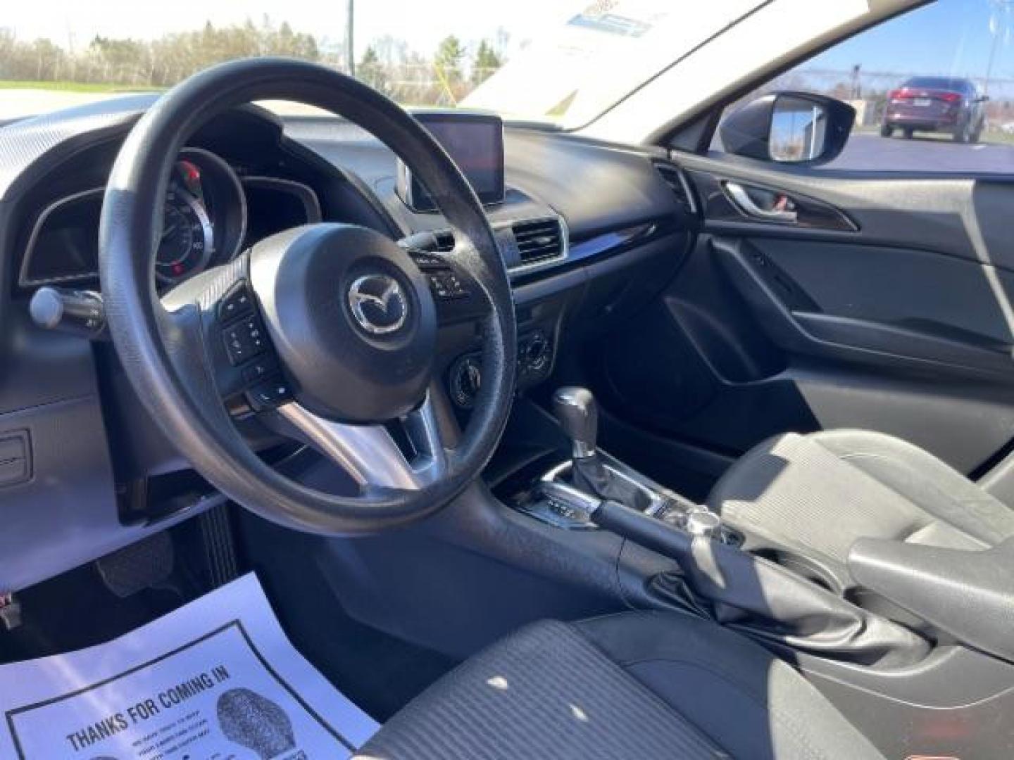 2016 Jet Black Mica Mazda MAZDA3 i Sport AT 4-Door (JM1BM1U73G1) with an 2.0L L4 DOHC 16V engine, 6-Speed Automatic transmission, located at 880 E. National Road, Vandalia, OH, 45377, (937) 908-9800, 39.892189, -84.181015 - Photo#5