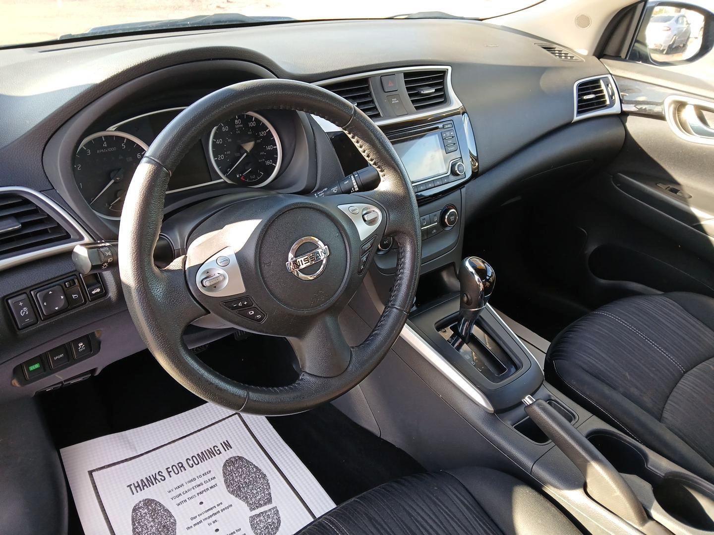 2016 Super Black Nissan Sentra FE+ S (3N1AB7AP2GL) with an 1.8L L4 SFI DOHC 16V engine, CVT transmission, located at 1184 Kauffman Ave, Fairborn, OH, 45324, (937) 908-9800, 39.807365, -84.029114 - Photo#8