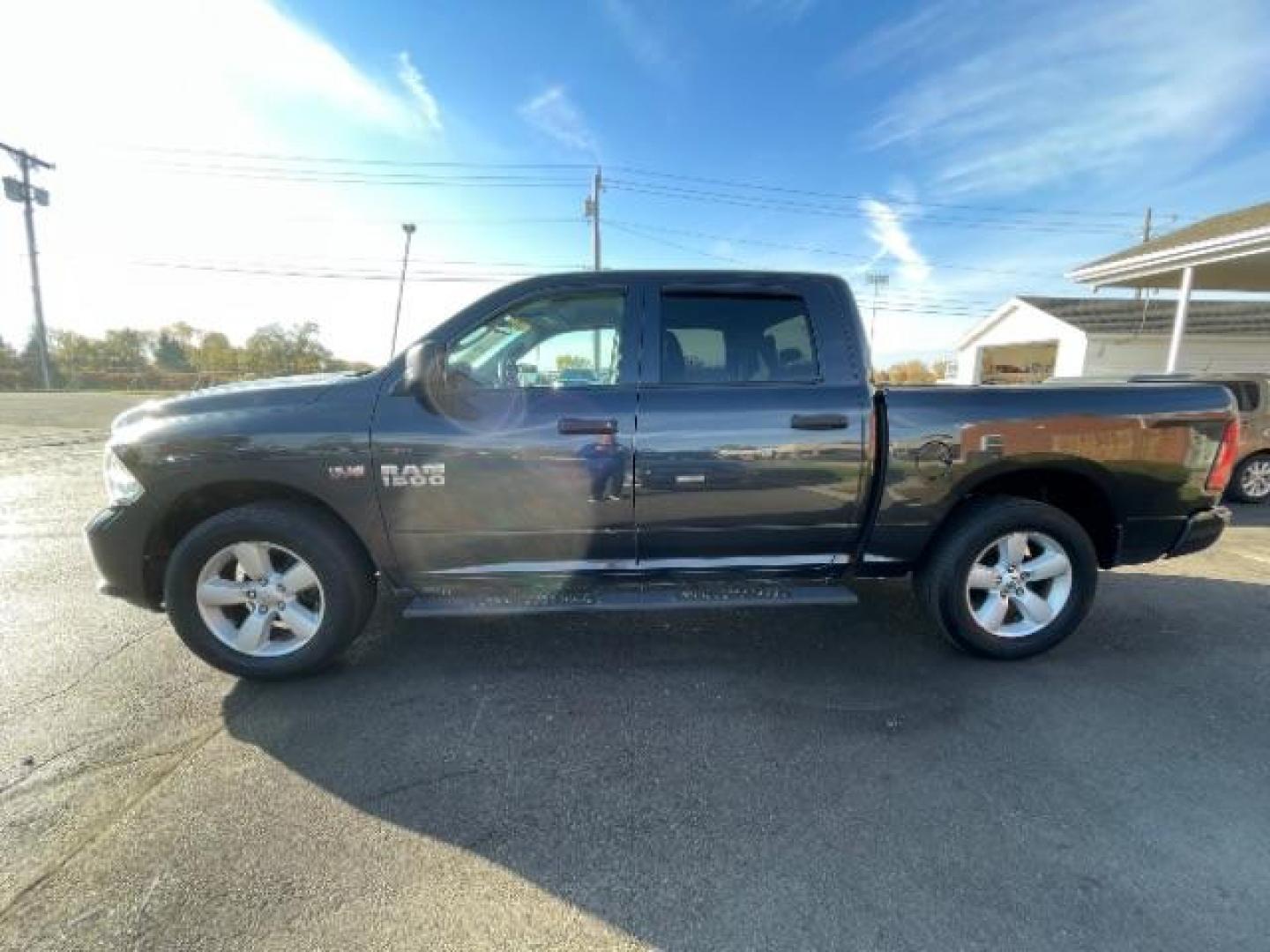 2016 Granite Crystal Metallic Clear Coat RAM 1500 Tradesman Crew Cab SWB 4WD (3C6RR7KTXGG) with an 5.7L V8 OHV 16V engine, 8-Speed Automatic transmission, located at 401 Woodman Dr, Riverside, OH, 45431, (937) 908-9800, 39.763779, -84.122063 - Photo#2