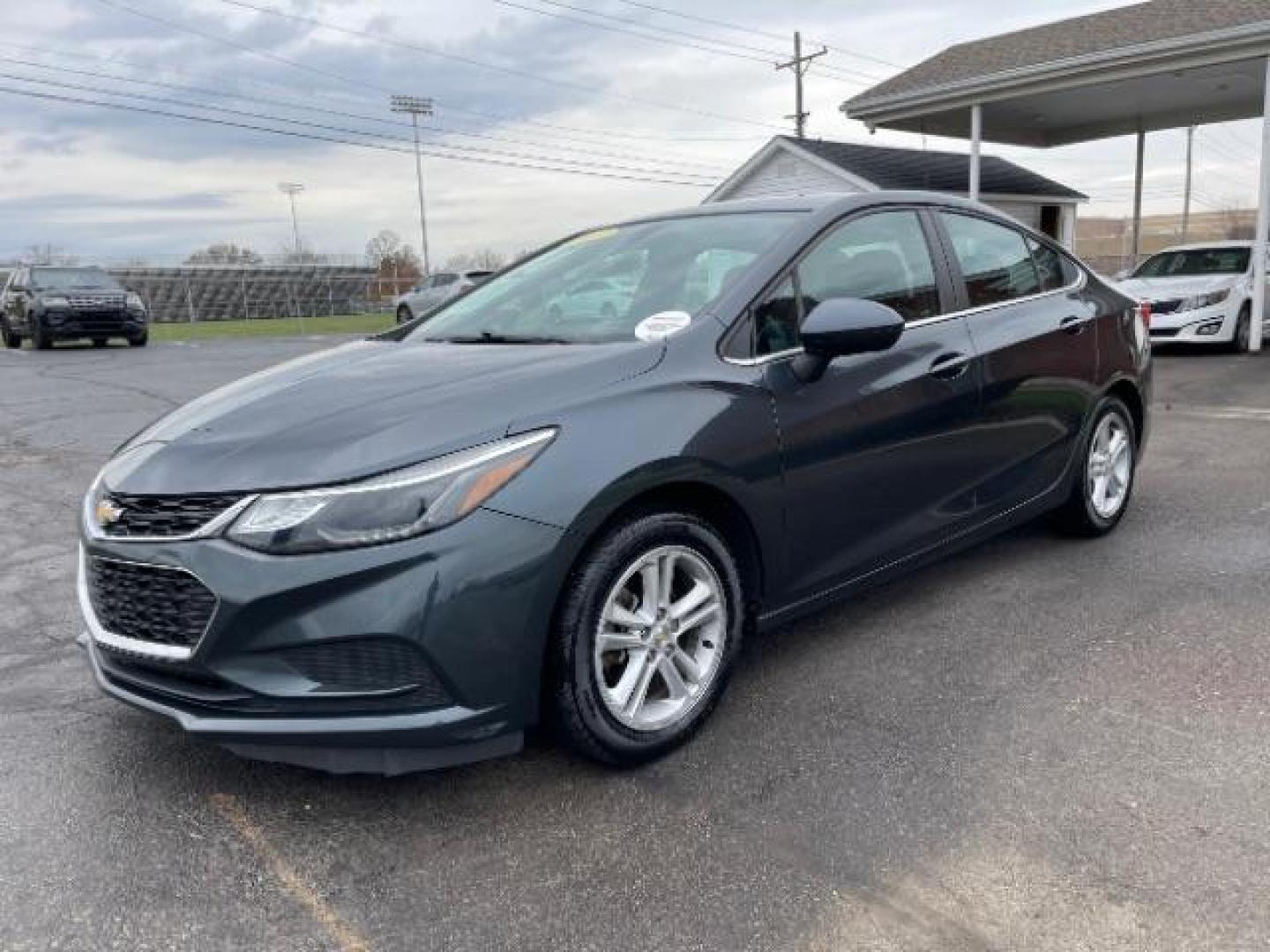 2017 Tungsten Metallic Chevrolet Cruze LT Auto (1G1BE5SM0H7) with an 1.4L L4 DOHC 16V TURBO engine, 6-Speed Automatic transmission, located at 1099 N County Rd 25A, OH, 45373, (937) 908-9800, 40.057079, -84.212883 - Photo#1