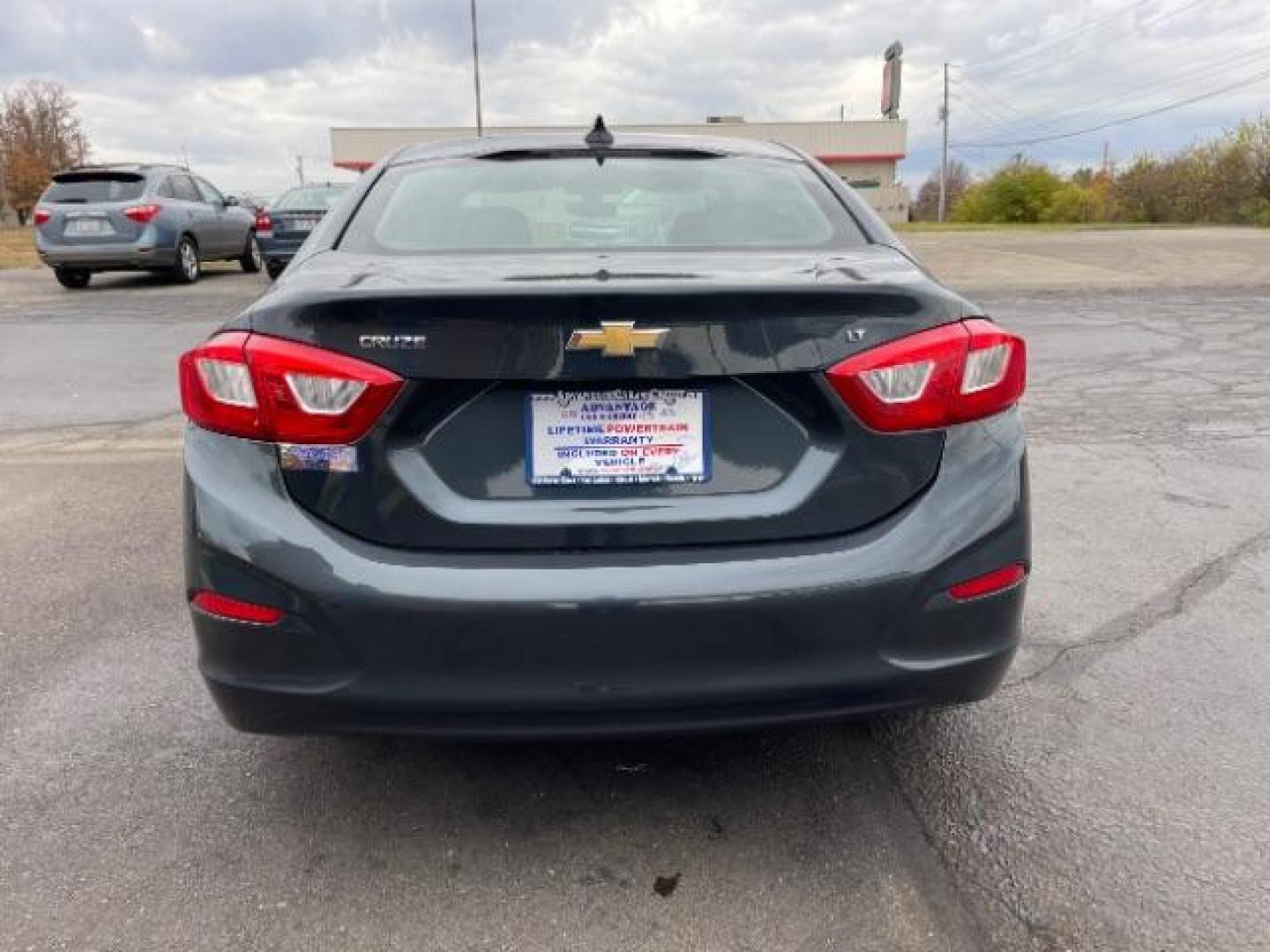 2017 Tungsten Metallic Chevrolet Cruze LT Auto (1G1BE5SM0H7) with an 1.4L L4 DOHC 16V TURBO engine, 6-Speed Automatic transmission, located at 1099 N County Rd 25A, OH, 45373, (937) 908-9800, 40.057079, -84.212883 - Photo#4