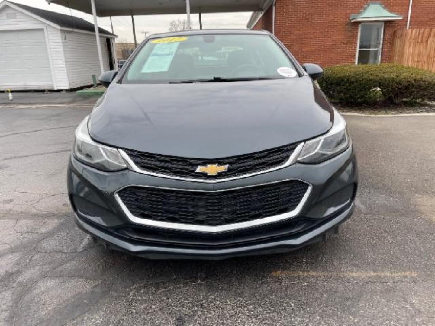 2017 Tungsten Metallic Chevrolet Cruze LT Auto (1G1BE5SM0H7) with an 1.4L L4 DOHC 16V TURBO engine, 6-Speed Automatic transmission, located at 1099 N County Rd 25A, OH, 45373, (937) 908-9800, 40.057079, -84.212883 - Photo#5