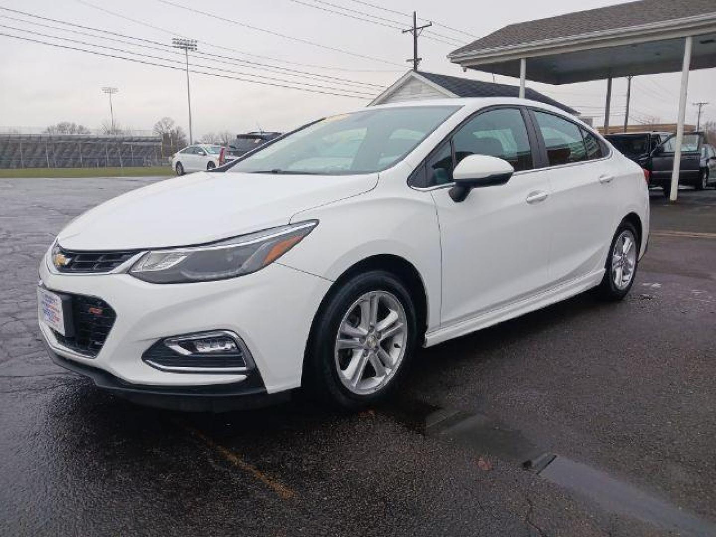 2017 Summit White Chevrolet Cruze LT Auto (1G1BE5SM9H7) with an 1.4L L4 DOHC 16V TURBO engine, 6-Speed Automatic transmission, located at 1099 N County Rd 25A, OH, 45373, (937) 908-9800, 40.057079, -84.212883 - Photo#2