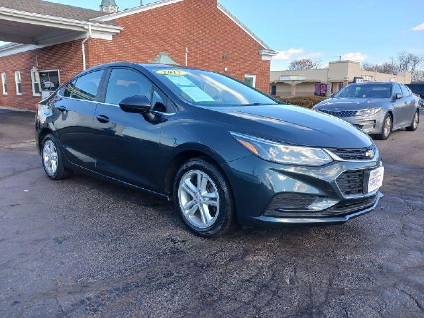 2017 Chevrolet Cruze LT Auto (3G1BE5SM0HS) with an 1.4L L4 DOHC 16V TURBO engine, 6-Speed Automatic transmission, located at 1230 East Main St, Xenia, OH, 45385, (937) 908-9800, 39.688026, -83.910172 - 2017 Chevrolet Cruze LT Auto - Photo#0