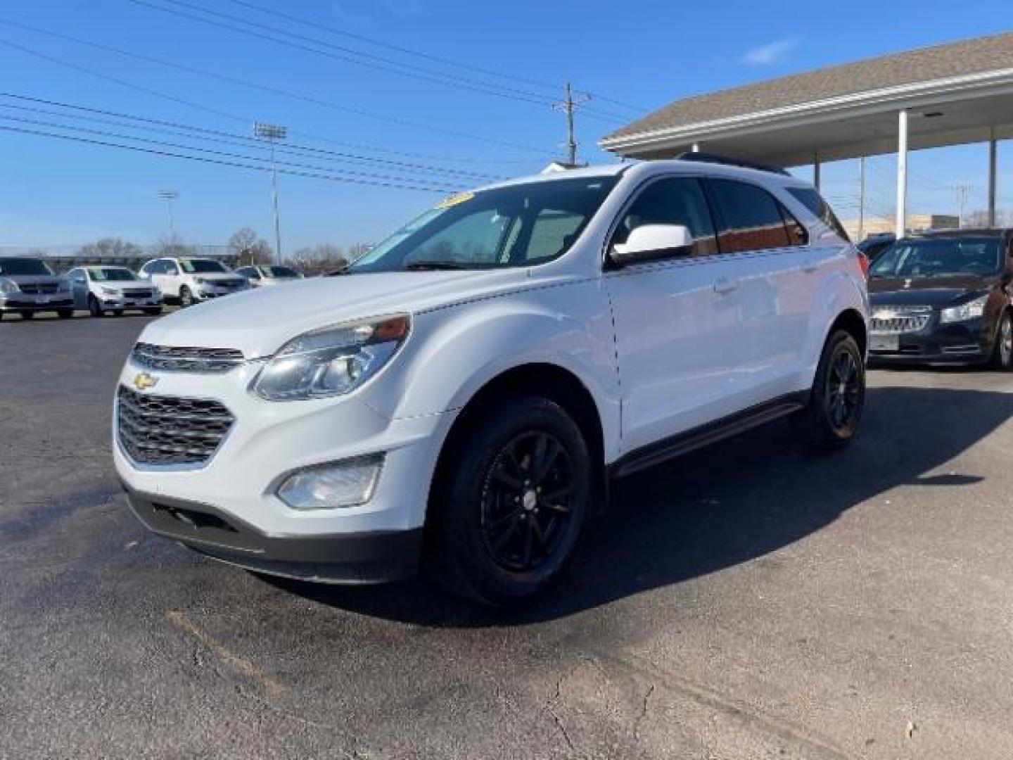 2017 Summit White Chevrolet Equinox LT AWD (2GNFLFEK1H6) with an 2.4L L4 DOHC 16V FFV engine, 6-Speed Automatic transmission, located at 1951 S Dayton Lakeview Rd., New Carlisle, OH, 45344, (937) 908-9800, 39.890999, -84.050255 - Photo#1