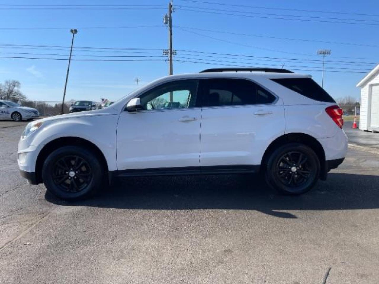 2017 Summit White Chevrolet Equinox LT AWD (2GNFLFEK1H6) with an 2.4L L4 DOHC 16V FFV engine, 6-Speed Automatic transmission, located at 1951 S Dayton Lakeview Rd., New Carlisle, OH, 45344, (937) 908-9800, 39.890999, -84.050255 - Photo#4