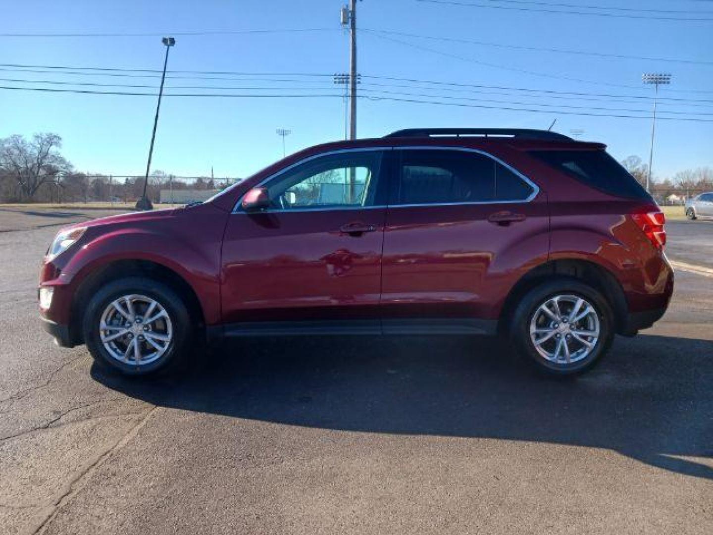 2017 Siren Red Tintcoat Chevrolet Equinox LT AWD (2GNFLFEKXH6) with an 2.4L L4 DOHC 16V FFV engine, 6-Speed Automatic transmission, located at 880 E. National Road, Vandalia, OH, 45377, (937) 908-9800, 39.892189, -84.181015 - Photo#3