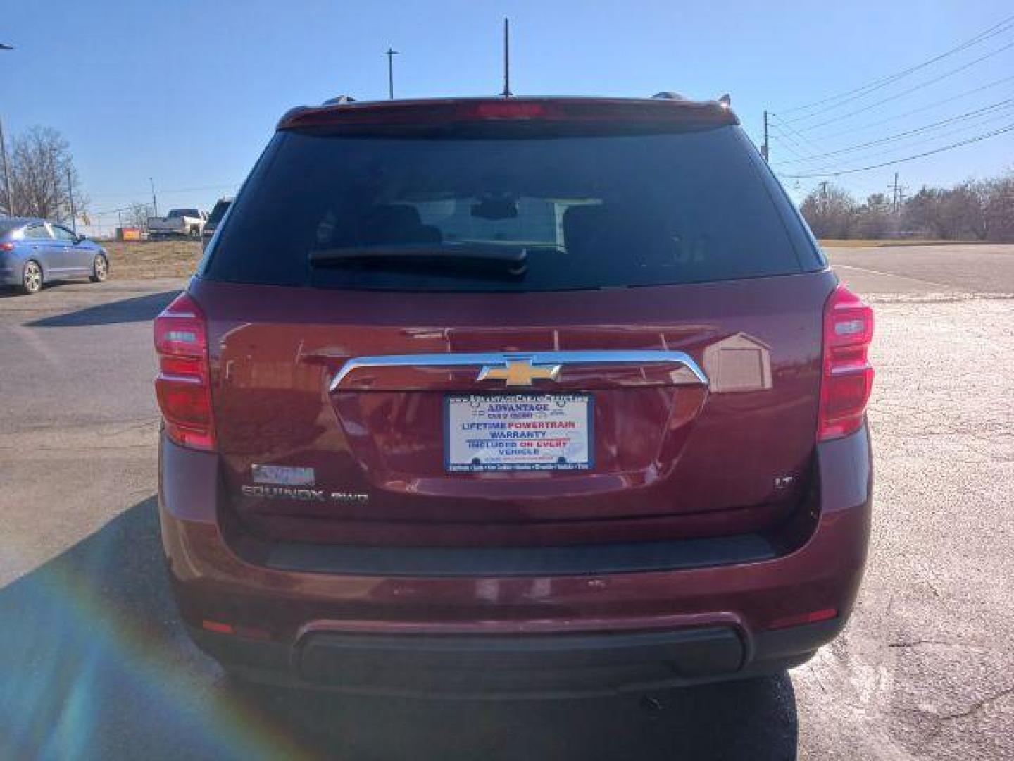 2017 Siren Red Tintcoat Chevrolet Equinox LT AWD (2GNFLFEKXH6) with an 2.4L L4 DOHC 16V FFV engine, 6-Speed Automatic transmission, located at 880 E. National Road, Vandalia, OH, 45377, (937) 908-9800, 39.892189, -84.181015 - Photo#5