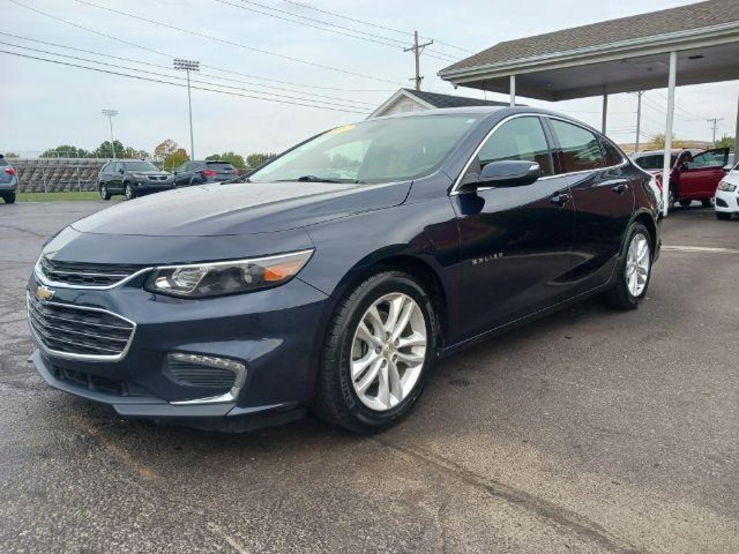 2017 Arctic Blue Metallic Chevrolet Malibu 1LT (1G1ZE5ST5HF) with an 1.5L L4 DOHC 16V engine, 6-Speed Automatic transmission, located at 1951 S Dayton Lakeview Rd., New Carlisle, OH, 45344, (937) 908-9800, 39.890999, -84.050255 - Photo#2