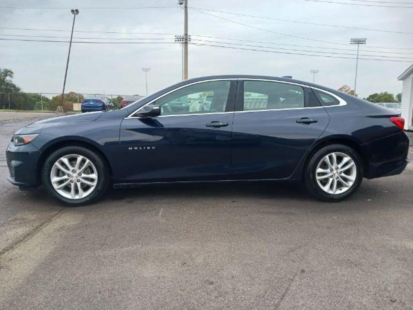 2017 Arctic Blue Metallic Chevrolet Malibu 1LT (1G1ZE5ST5HF) with an 1.5L L4 DOHC 16V engine, 6-Speed Automatic transmission, located at 1951 S Dayton Lakeview Rd., New Carlisle, OH, 45344, (937) 908-9800, 39.890999, -84.050255 - Photo#3