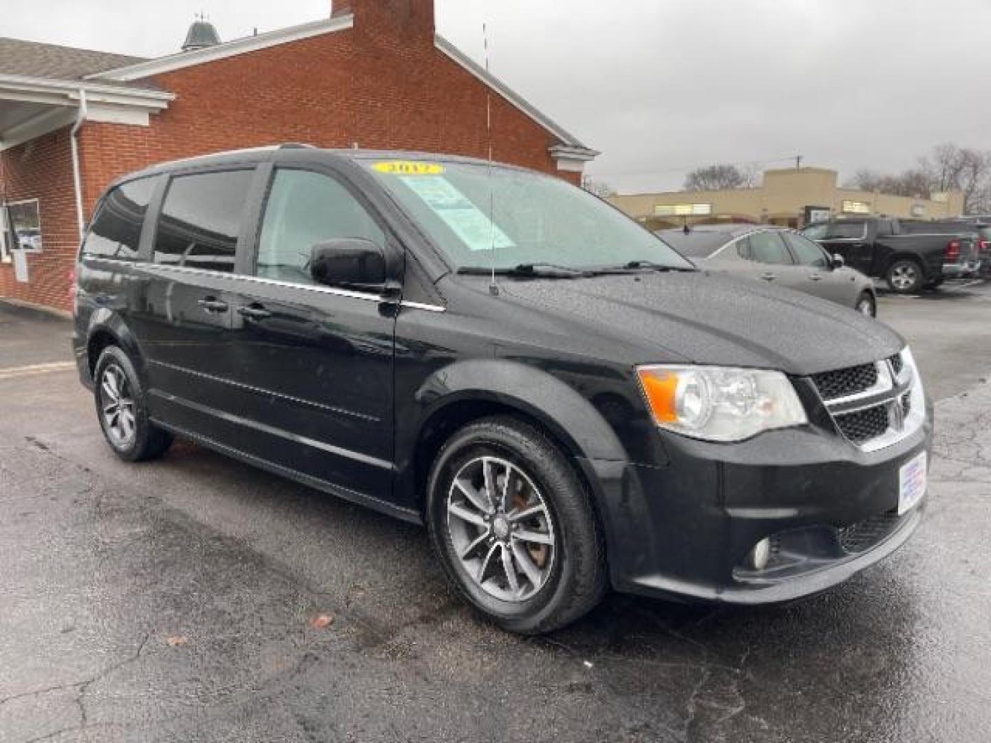 2017 Brilliant Black Crystal Pearl Coat Dodge Grand Caravan SXT (2C4RDGCG4HR) with an 3.6L V6 DOHC 24V engine, 6-Speed Automatic transmission, located at 1230 East Main St, Xenia, OH, 45385, (937) 908-9800, 39.687321, -83.910294 - Photo#0