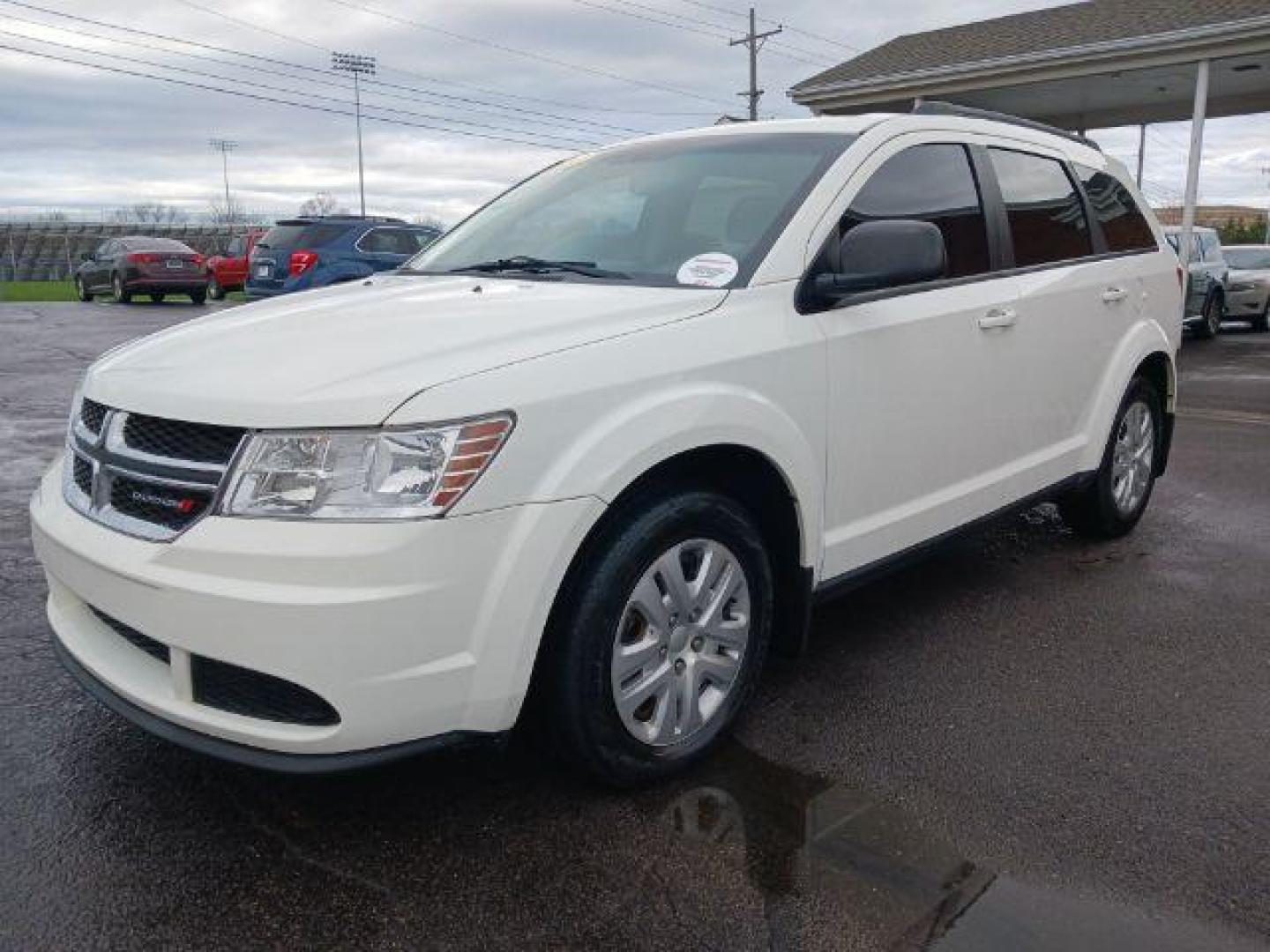 2017 White Dodge Journey SE (3C4PDCAB8HT) with an 2.4L L4 DOHC 16V engine, 4-Speed Automatic transmission, located at 1951 S Dayton Lakeview Rd., New Carlisle, OH, 45344, (937) 908-9800, 39.890999, -84.050255 - Photo#2