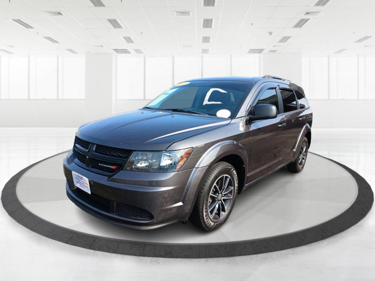 2017 Granite Metallic Clear Coat Dodge Journey SE (3C4PDCAB5HT) with an 2.4L L4 DOHC 16V engine, 4A transmission, located at 1951 S Dayton Lakeview Rd., New Carlisle, OH, 45344, (937) 908-9800, 39.890999, -84.050255 - Photo#4