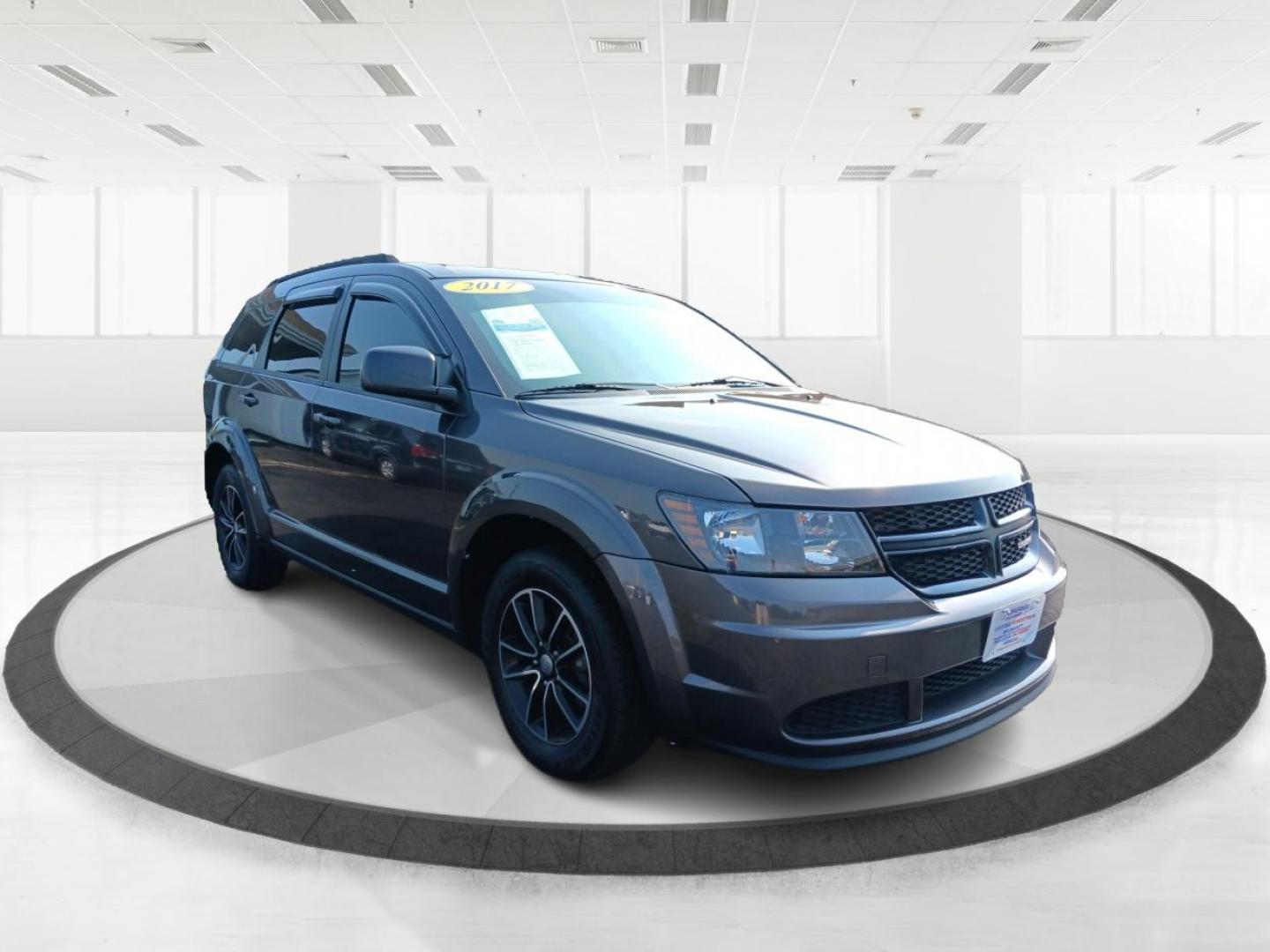 2017 Granite Metallic Clear Coat Dodge Journey SE (3C4PDCAB5HT) with an 2.4L L4 DOHC 16V engine, 4A transmission, located at 1951 S Dayton Lakeview Rd., New Carlisle, OH, 45344, (937) 908-9800, 39.890999, -84.050255 - Photo#5