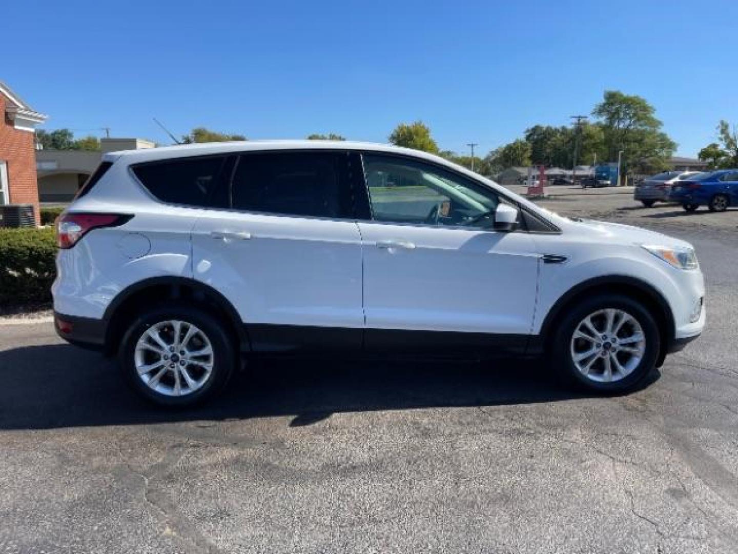 2017 White Platinum Tri-Coat Metallic Ford Escape SE FWD (1FMCU0GD1HU) with an 1.5L L4 DOHC 16V engine, 6-Speed Automatic transmission, located at 880 E. National Road, Vandalia, OH, 45377, (937) 908-9800, 39.892189, -84.181015 - Photo#3