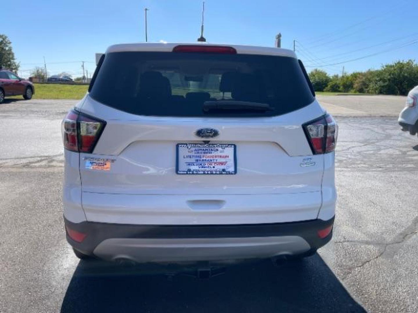 2017 White Platinum Tri-Coat Metallic Ford Escape SE FWD (1FMCU0GD1HU) with an 1.5L L4 DOHC 16V engine, 6-Speed Automatic transmission, located at 880 E. National Road, Vandalia, OH, 45377, (937) 908-9800, 39.892189, -84.181015 - Photo#5