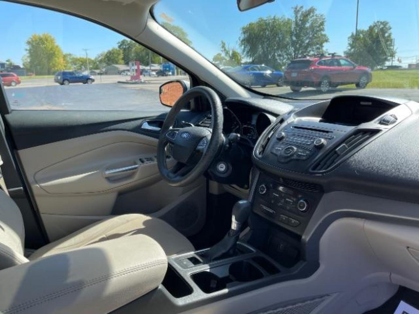 2017 White Platinum Tri-Coat Metallic Ford Escape SE FWD (1FMCU0GD1HU) with an 1.5L L4 DOHC 16V engine, 6-Speed Automatic transmission, located at 880 E. National Road, Vandalia, OH, 45377, (937) 908-9800, 39.892189, -84.181015 - Photo#6