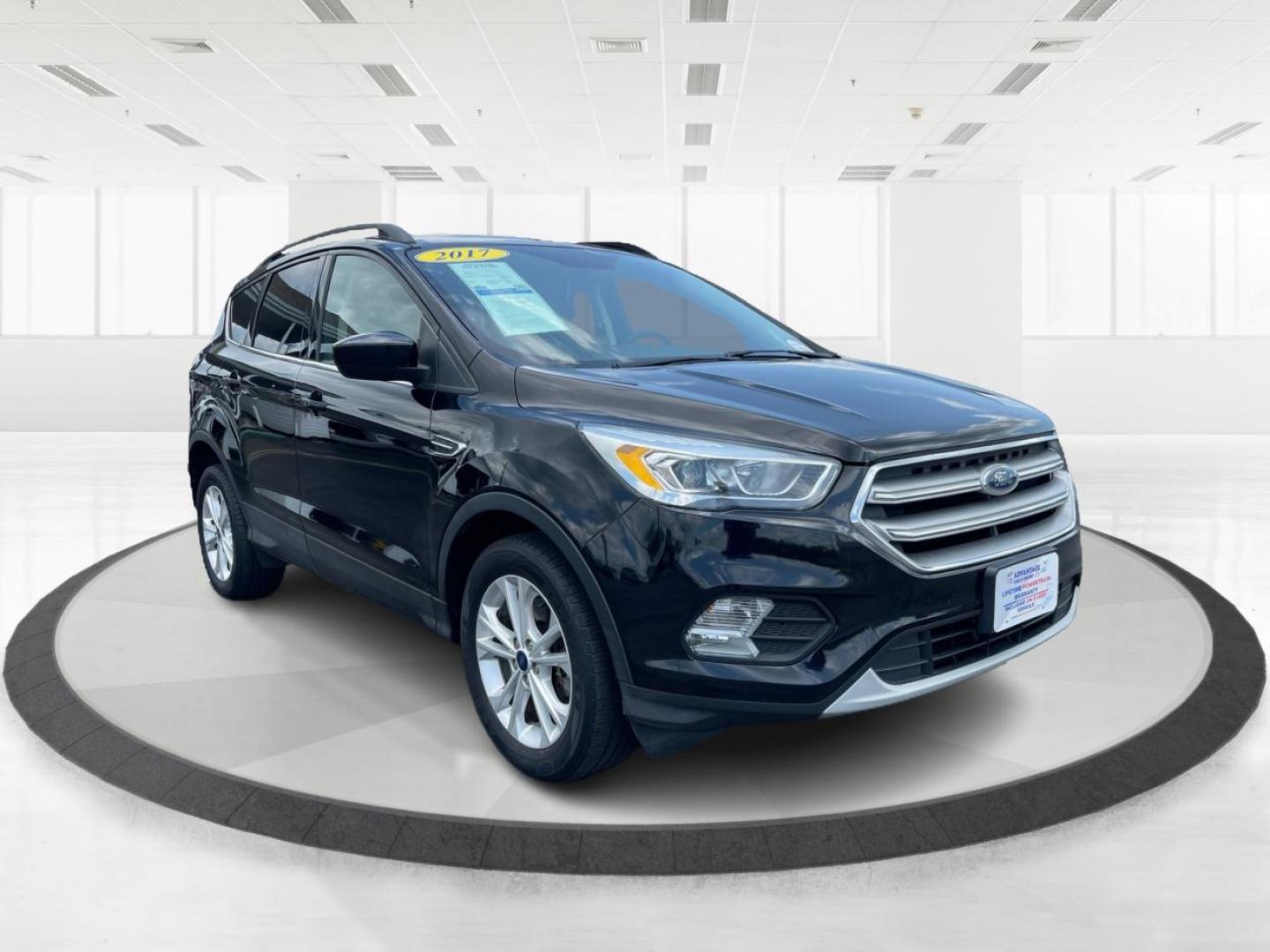 2017 Shadow Black Ford Escape SE 4WD (1FMCU9GD9HU) with an 1.5L L4 DOHC 16V engine, 6A transmission, located at 1230 East Main St, Xenia, OH, 45385, (937) 908-9800, 39.687321, -83.910294 - Photo#0