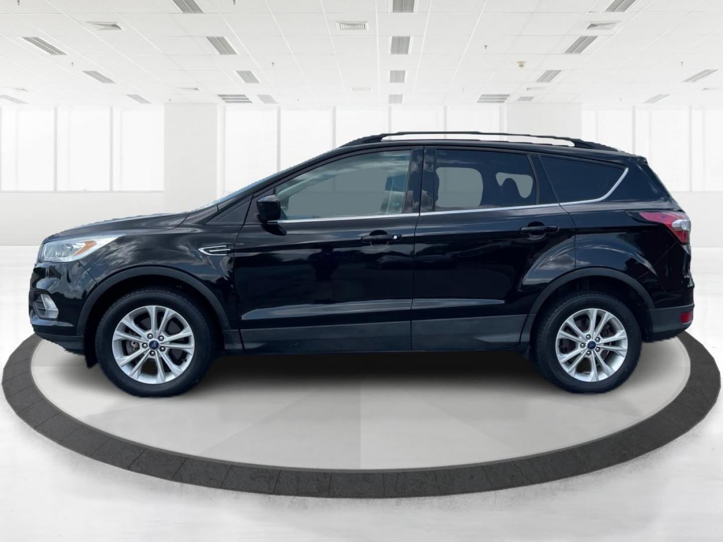 2017 Shadow Black Ford Escape SE 4WD (1FMCU9GD9HU) with an 1.5L L4 DOHC 16V engine, 6A transmission, located at 1230 East Main St, Xenia, OH, 45385, (937) 908-9800, 39.687321, -83.910294 - Photo#5