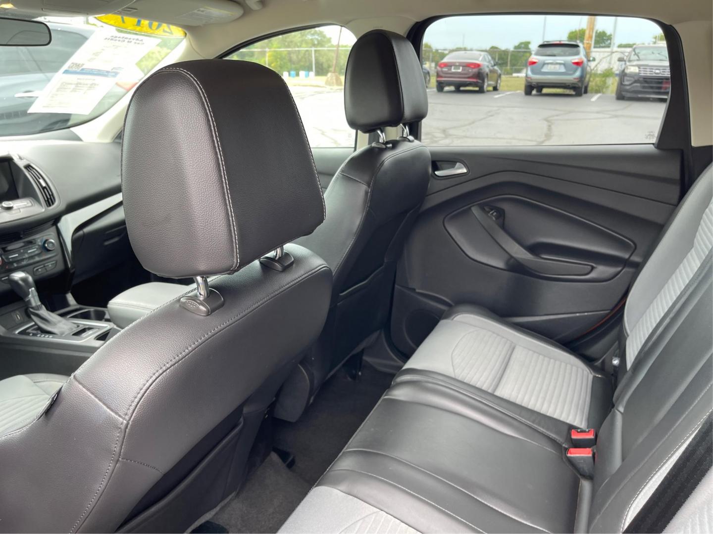 2017 Ruby Red Metallic Tinted Clearcoat Ford Escape (1FMCU9GD9HU) with an 1.5L L4 DOHC 16V engine, 6-Speed Automatic transmission, located at 880 E. National Road, Vandalia, OH, 45377, (937) 908-9800, 39.892189, -84.181015 - Photo#9