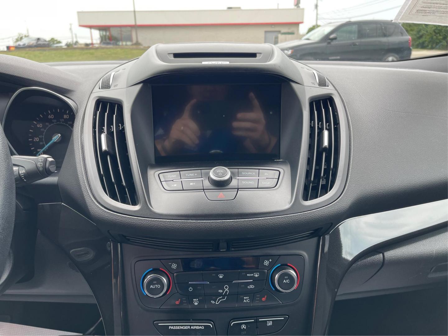 2017 Ruby Red Metallic Tinted Clearcoat Ford Escape (1FMCU9GD9HU) with an 1.5L L4 DOHC 16V engine, 6-Speed Automatic transmission, located at 880 E. National Road, Vandalia, OH, 45377, (937) 908-9800, 39.892189, -84.181015 - Photo#12