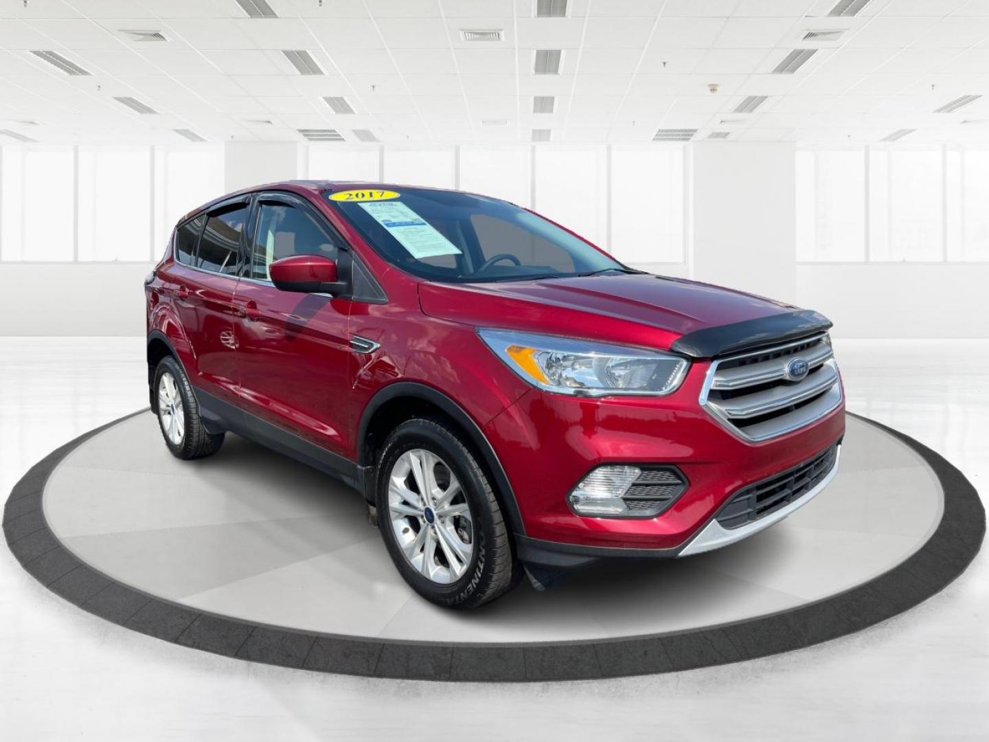 2017 Ruby Red Metallic Tinted Clearcoat Ford Escape (1FMCU9GD0HU) with an 1.5L L4 DOHC 16V engine, 6-Speed Automatic transmission, located at 880 E. National Road, Vandalia, OH, 45377, (937) 908-9800, 39.892189, -84.181015 - Photo#0