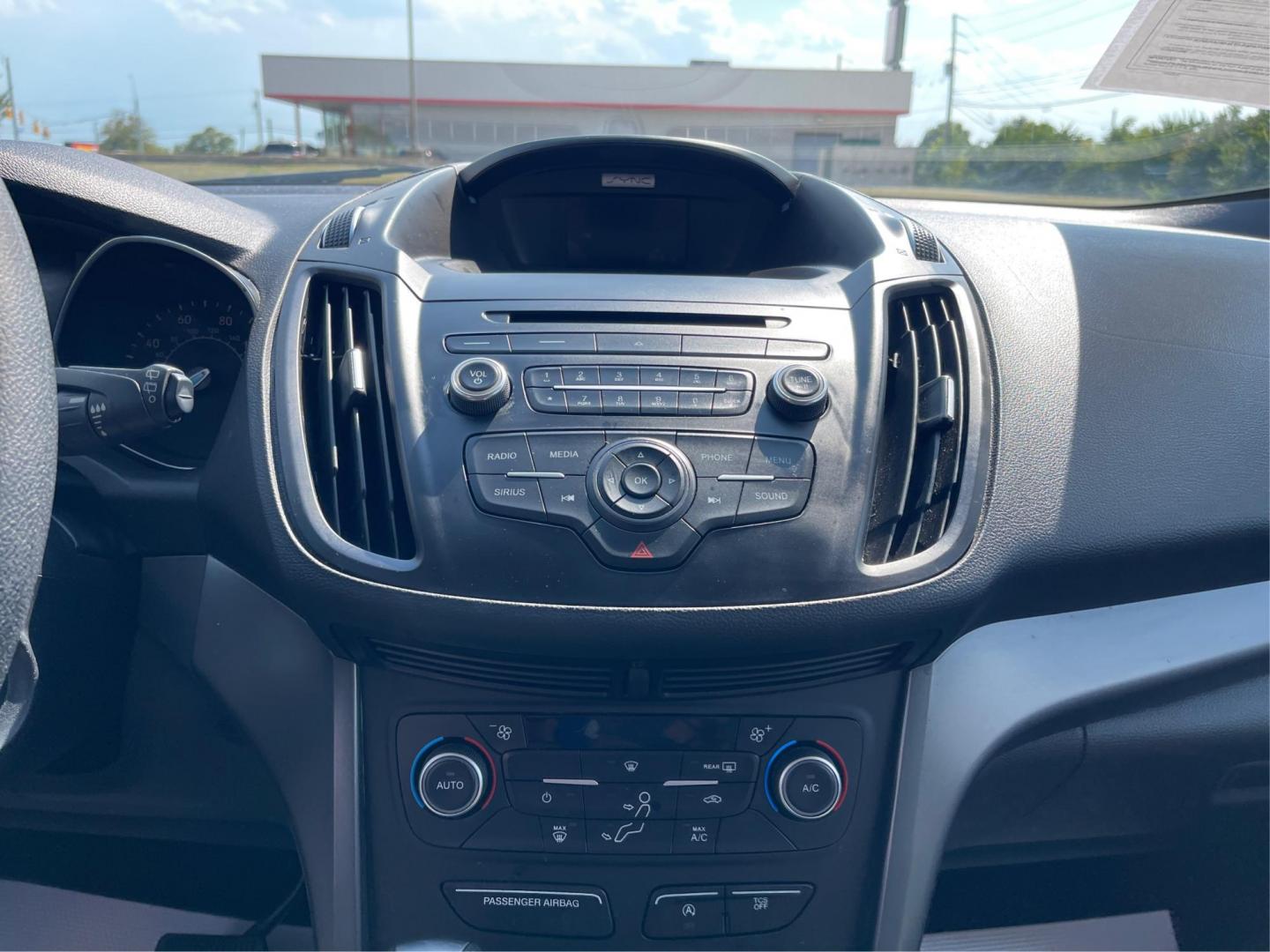 2017 Ruby Red Metallic Tinted Clearcoat Ford Escape (1FMCU9GD0HU) with an 1.5L L4 DOHC 16V engine, 6-Speed Automatic transmission, located at 880 E. National Road, Vandalia, OH, 45377, (937) 908-9800, 39.892189, -84.181015 - Photo#12