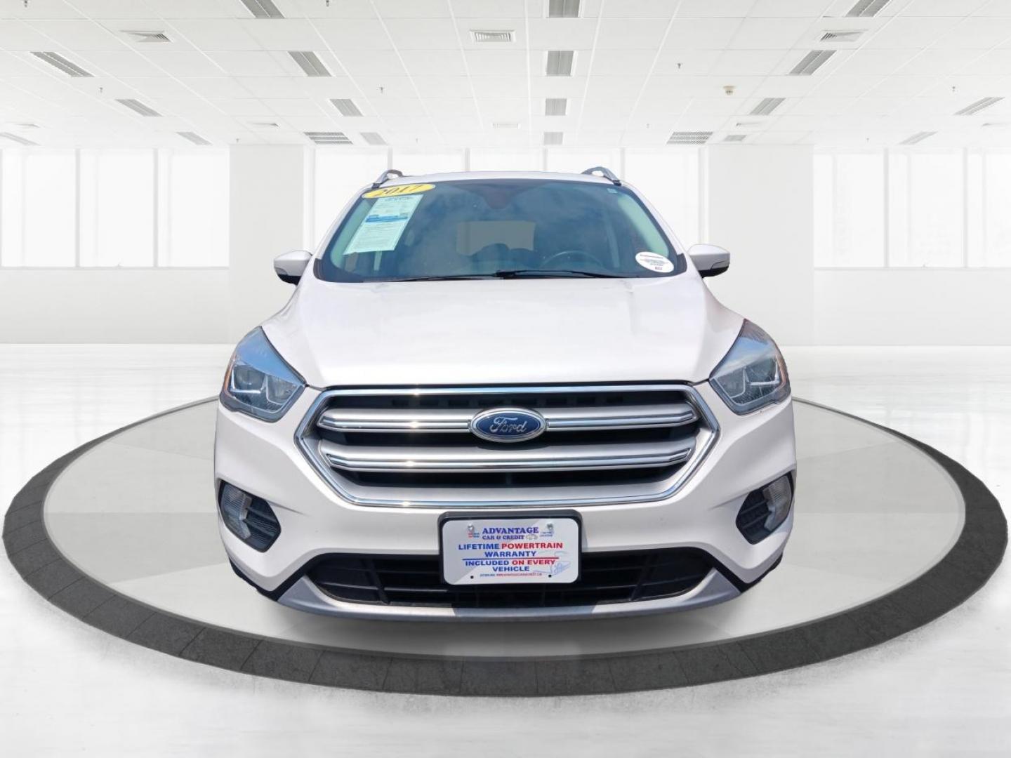 2017 White Gold Metallic Ford Escape (1FMCU9J96HU) with an 2.0L L4 DOHC 16V engine, 6-Speed Automatic transmission, located at 1099 N County Rd 25A, OH, 45373, (937) 908-9800, 40.057079, -84.212883 - Photo#6