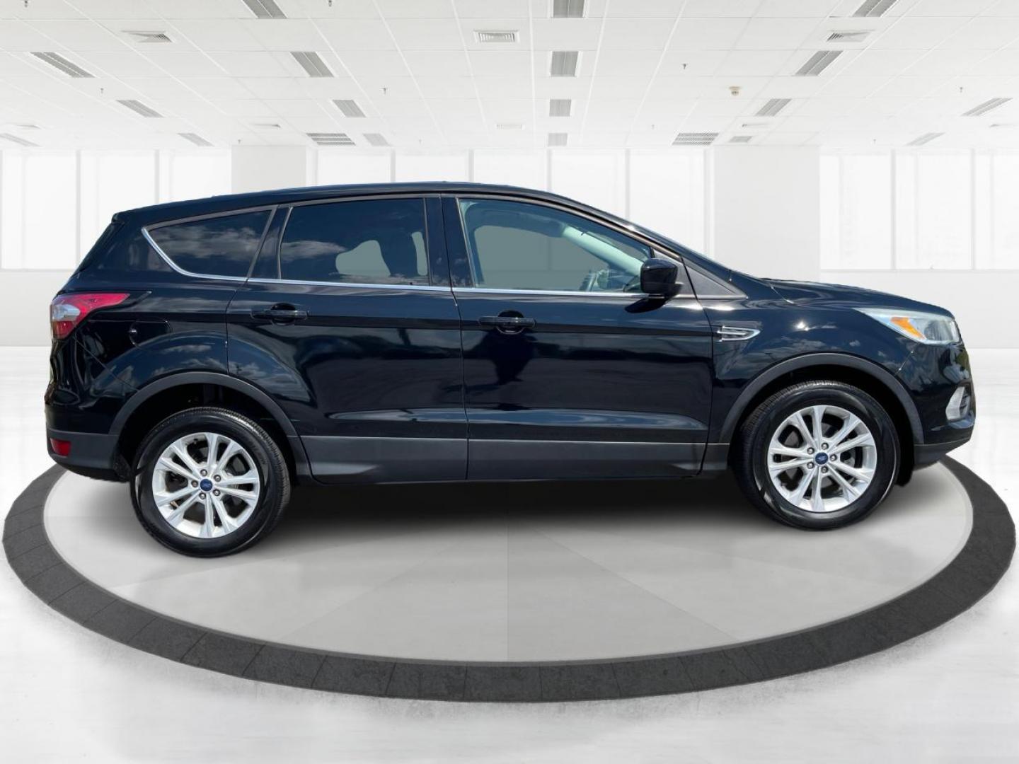 2017 Shadow Black Ford Escape SE FWD (1FMCU0GD6HU) with an 1.5L L4 DOHC 16V engine, 6-Speed Automatic transmission, located at 1230 East Main St, Xenia, OH, 45385, (937) 908-9800, 39.687321, -83.910294 - Photo#1