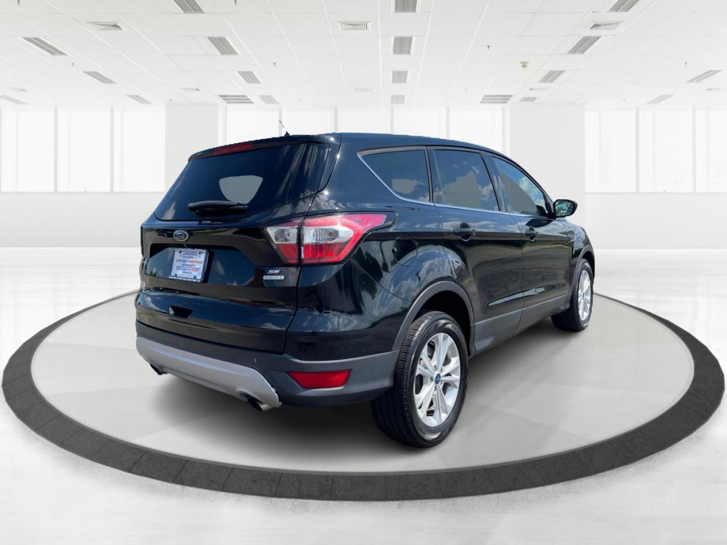 2017 Shadow Black Ford Escape SE FWD (1FMCU0GD6HU) with an 1.5L L4 DOHC 16V engine, 6-Speed Automatic transmission, located at 1230 East Main St, Xenia, OH, 45385, (937) 908-9800, 39.687321, -83.910294 - Photo#2