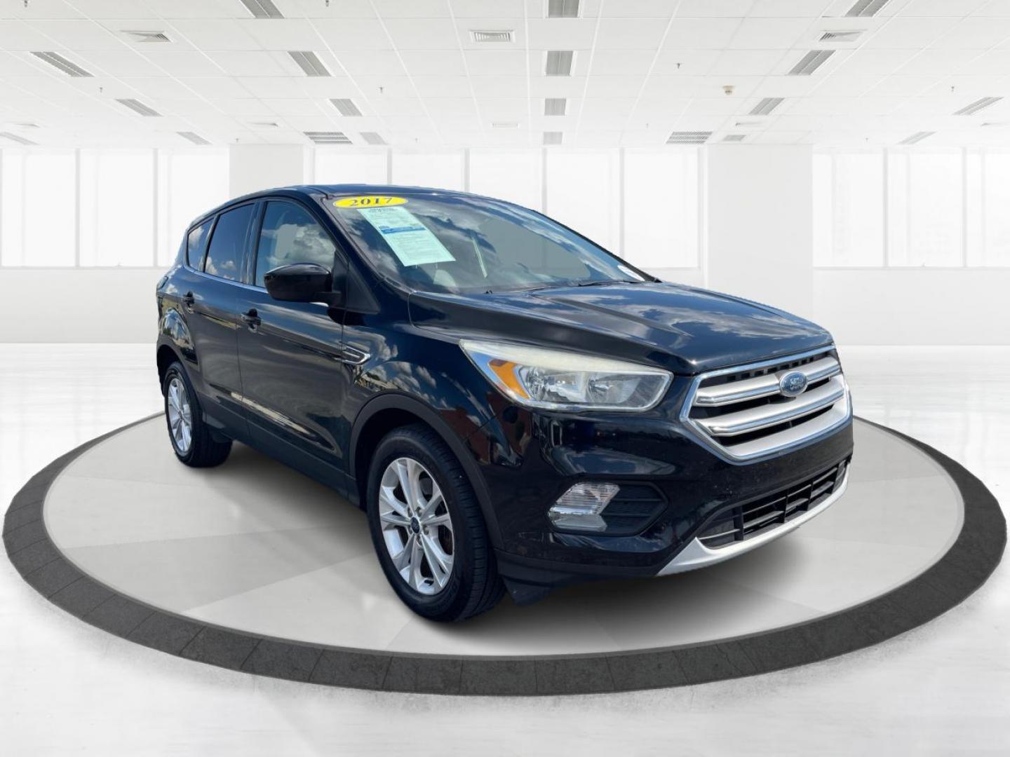 2017 Shadow Black Ford Escape SE FWD (1FMCU0GD6HU) with an 1.5L L4 DOHC 16V engine, 6-Speed Automatic transmission, located at 1230 East Main St, Xenia, OH, 45385, (937) 908-9800, 39.687321, -83.910294 - Photo#0