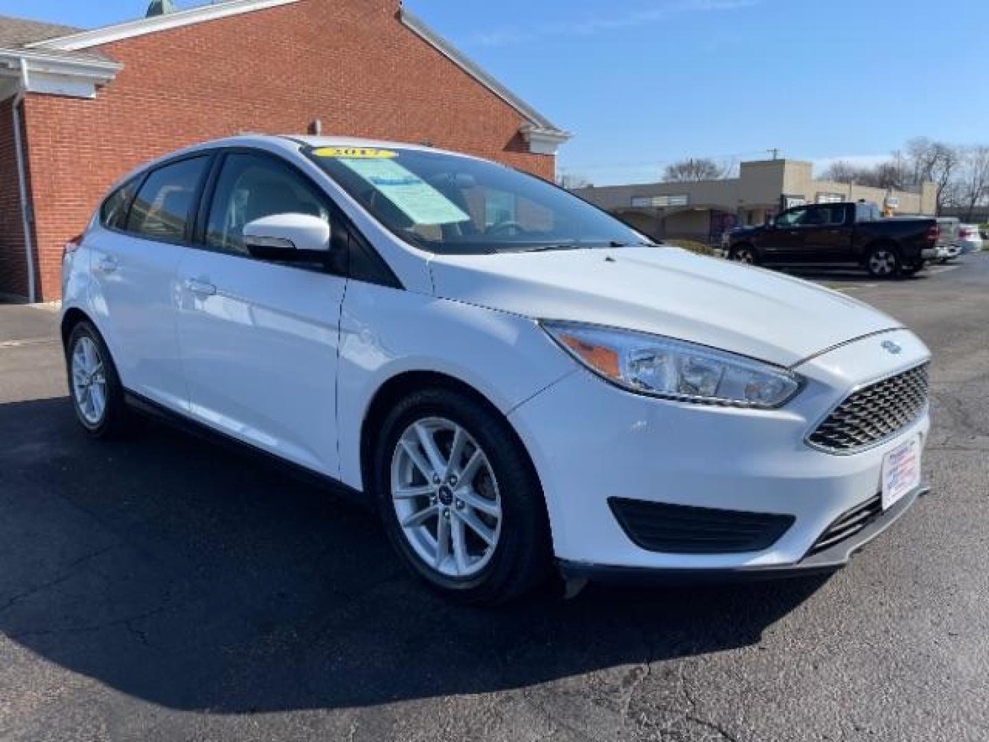 2017 Oxford White Ford Focus SE Hatch (1FADP3K22HL) with an 2.0L L4 DOHC 16V engine, located at 1099 N County Rd 25A, OH, 45373, (937) 908-9800, 40.057079, -84.212883 - Photo#0