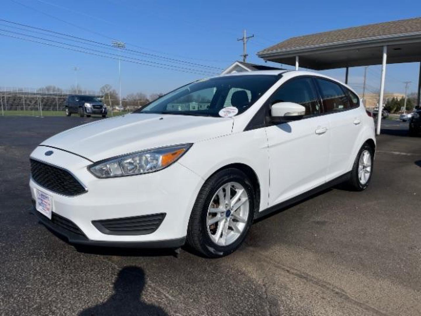 2017 Oxford White Ford Focus SE Hatch (1FADP3K22HL) with an 2.0L L4 DOHC 16V engine, located at 1099 N County Rd 25A, OH, 45373, (937) 908-9800, 40.057079, -84.212883 - Photo#1