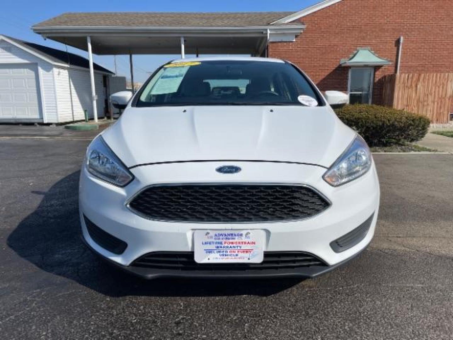 2017 Oxford White Ford Focus SE Hatch (1FADP3K22HL) with an 2.0L L4 DOHC 16V engine, located at 1099 N County Rd 25A, OH, 45373, (937) 908-9800, 40.057079, -84.212883 - Photo#2