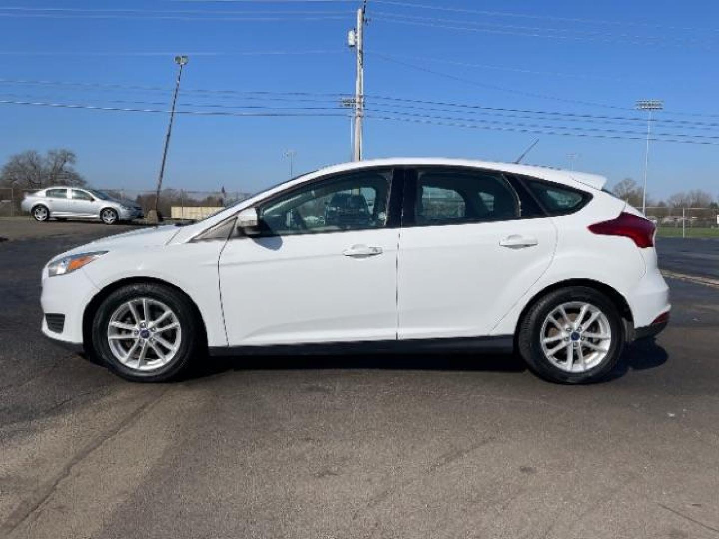 2017 Oxford White Ford Focus SE Hatch (1FADP3K22HL) with an 2.0L L4 DOHC 16V engine, located at 1099 N County Rd 25A, OH, 45373, (937) 908-9800, 40.057079, -84.212883 - Photo#4