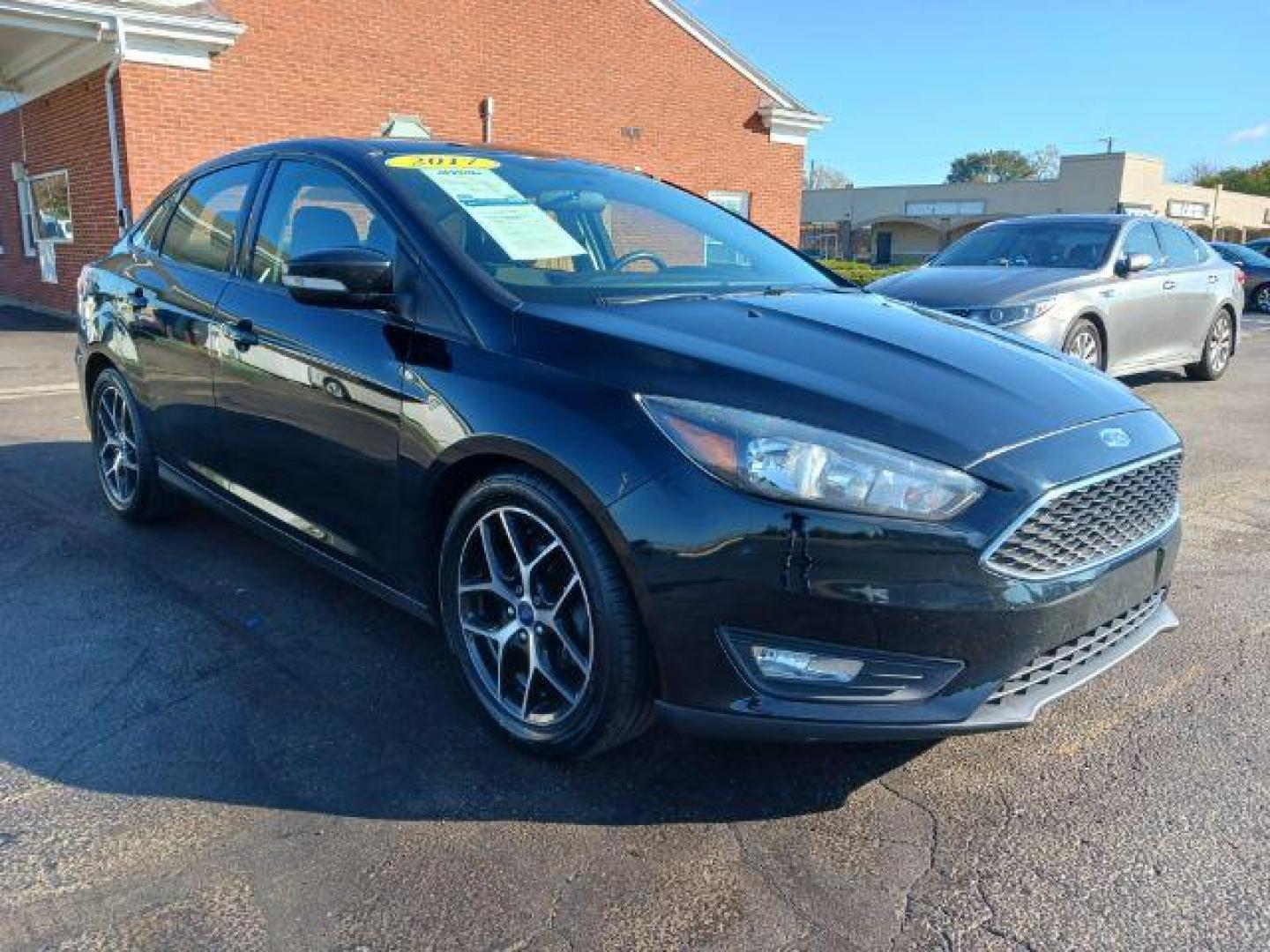 2017 Shadow Black Ford Focus SEL Sedan (1FADP3H2XHL) with an 2.0L L4 DOHC 16V engine, located at 4508 South Dixie Dr, Moraine, OH, 45439, (937) 908-9800, 39.690136, -84.216438 - Photo#0