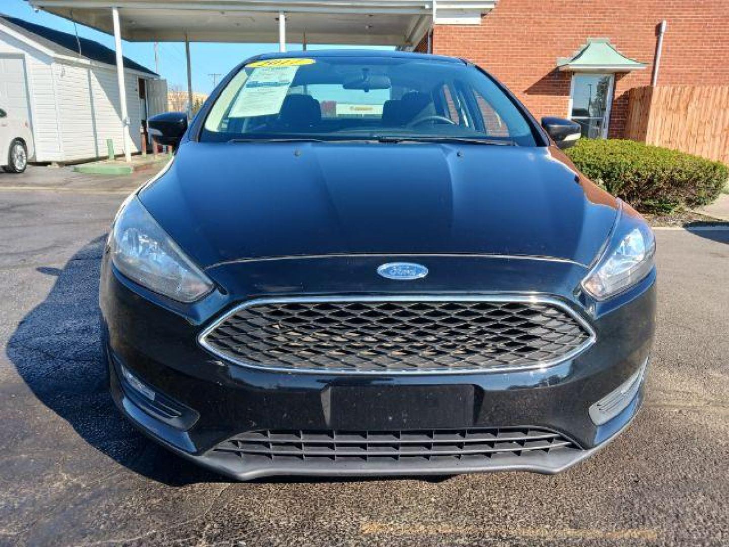 2017 Shadow Black Ford Focus SEL Sedan (1FADP3H2XHL) with an 2.0L L4 DOHC 16V engine, located at 4508 South Dixie Dr, Moraine, OH, 45439, (937) 908-9800, 39.690136, -84.216438 - Photo#1