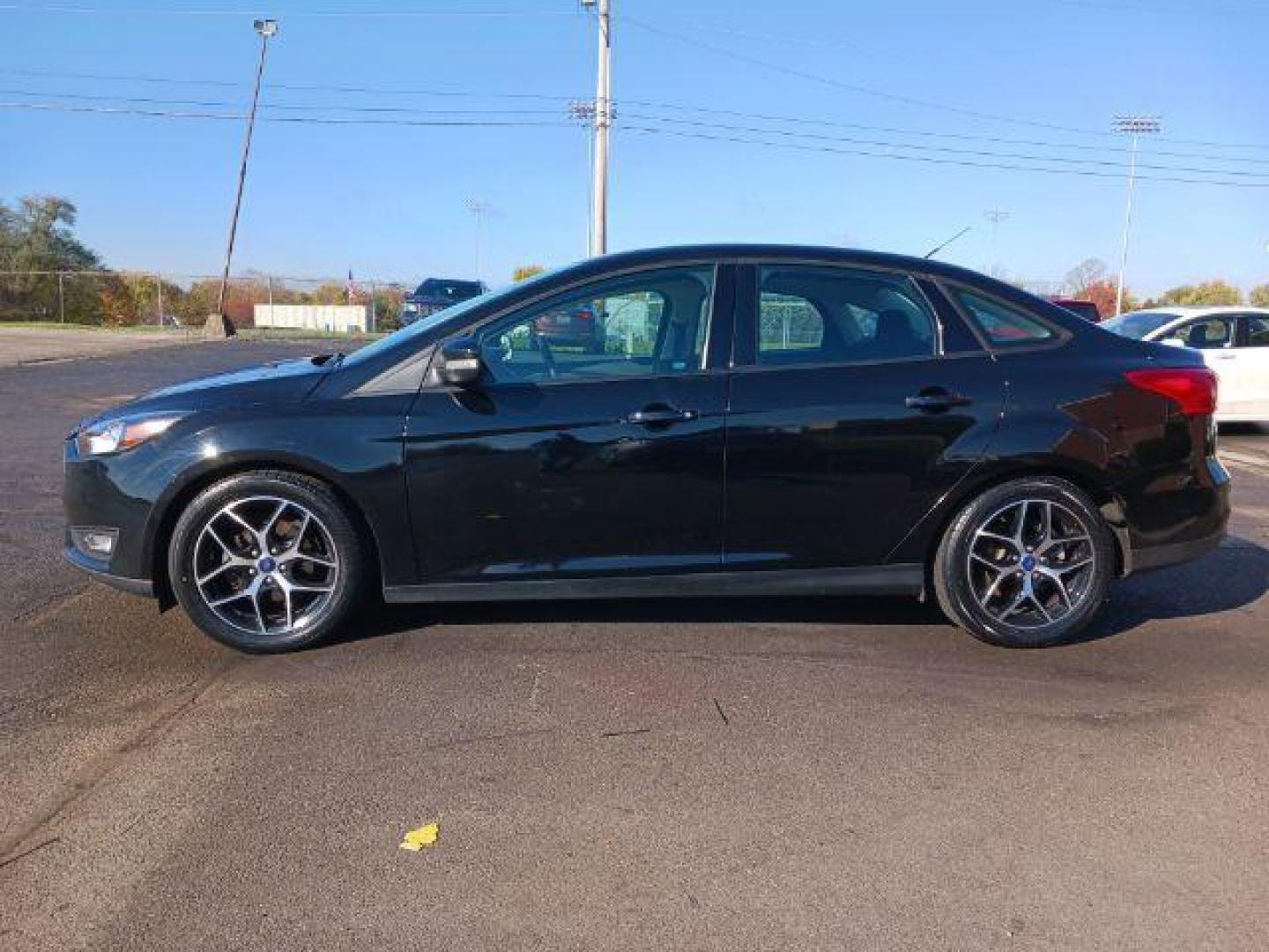 2017 Shadow Black Ford Focus SEL Sedan (1FADP3H2XHL) with an 2.0L L4 DOHC 16V engine, located at 4508 South Dixie Dr, Moraine, OH, 45439, (937) 908-9800, 39.690136, -84.216438 - Photo#3