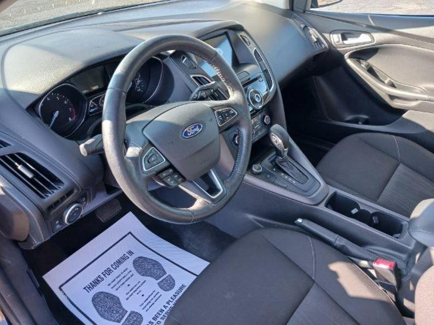 2017 Shadow Black Ford Focus SEL Sedan (1FADP3H2XHL) with an 2.0L L4 DOHC 16V engine, located at 4508 South Dixie Dr, Moraine, OH, 45439, (937) 908-9800, 39.690136, -84.216438 - Photo#6