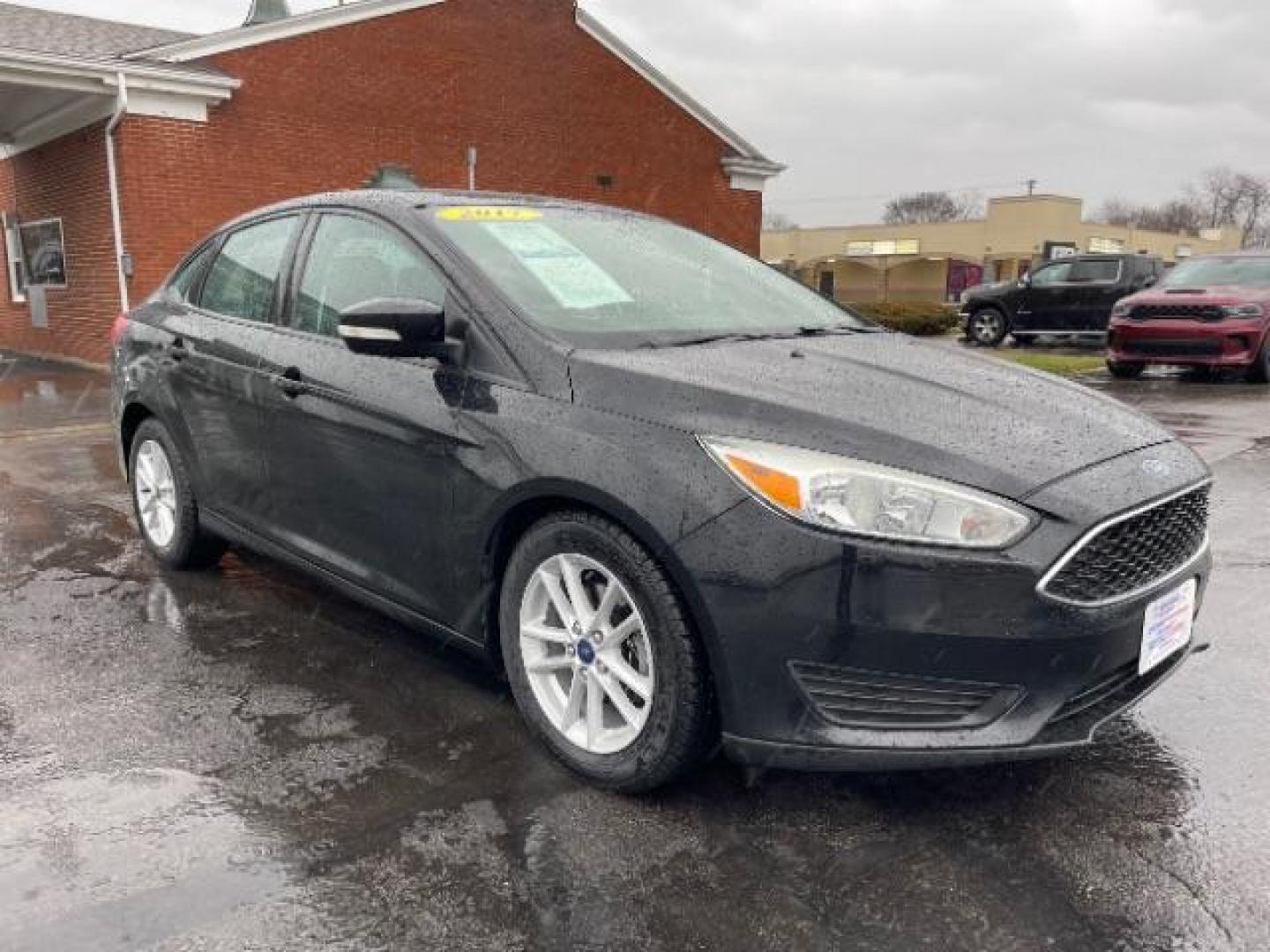 2017 Shadow Black Ford Focus SE Sedan (1FADP3F23HL) with an 2.0L L4 DOHC 16V engine, located at 1184 Kauffman Ave, Fairborn, OH, 45324, (937) 908-9800, 39.807365, -84.029114 - Photo#0