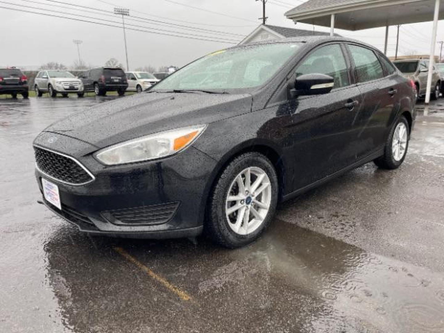 2017 Shadow Black Ford Focus SE Sedan (1FADP3F23HL) with an 2.0L L4 DOHC 16V engine, located at 1184 Kauffman Ave, Fairborn, OH, 45324, (937) 908-9800, 39.807365, -84.029114 - Photo#1