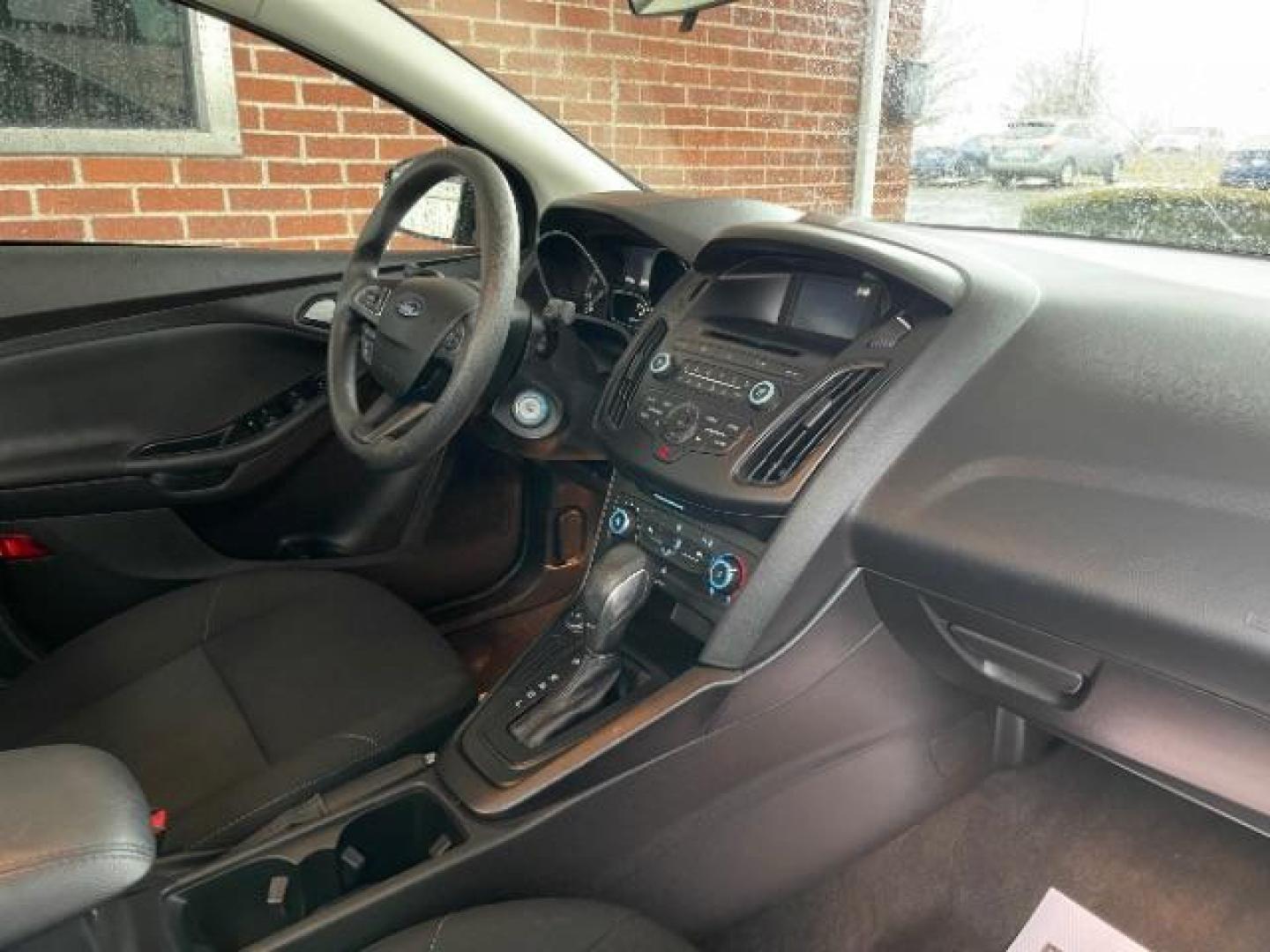 2017 Shadow Black Ford Focus SE Sedan (1FADP3F23HL) with an 2.0L L4 DOHC 16V engine, located at 1184 Kauffman Ave, Fairborn, OH, 45324, (937) 908-9800, 39.807365, -84.029114 - Photo#7