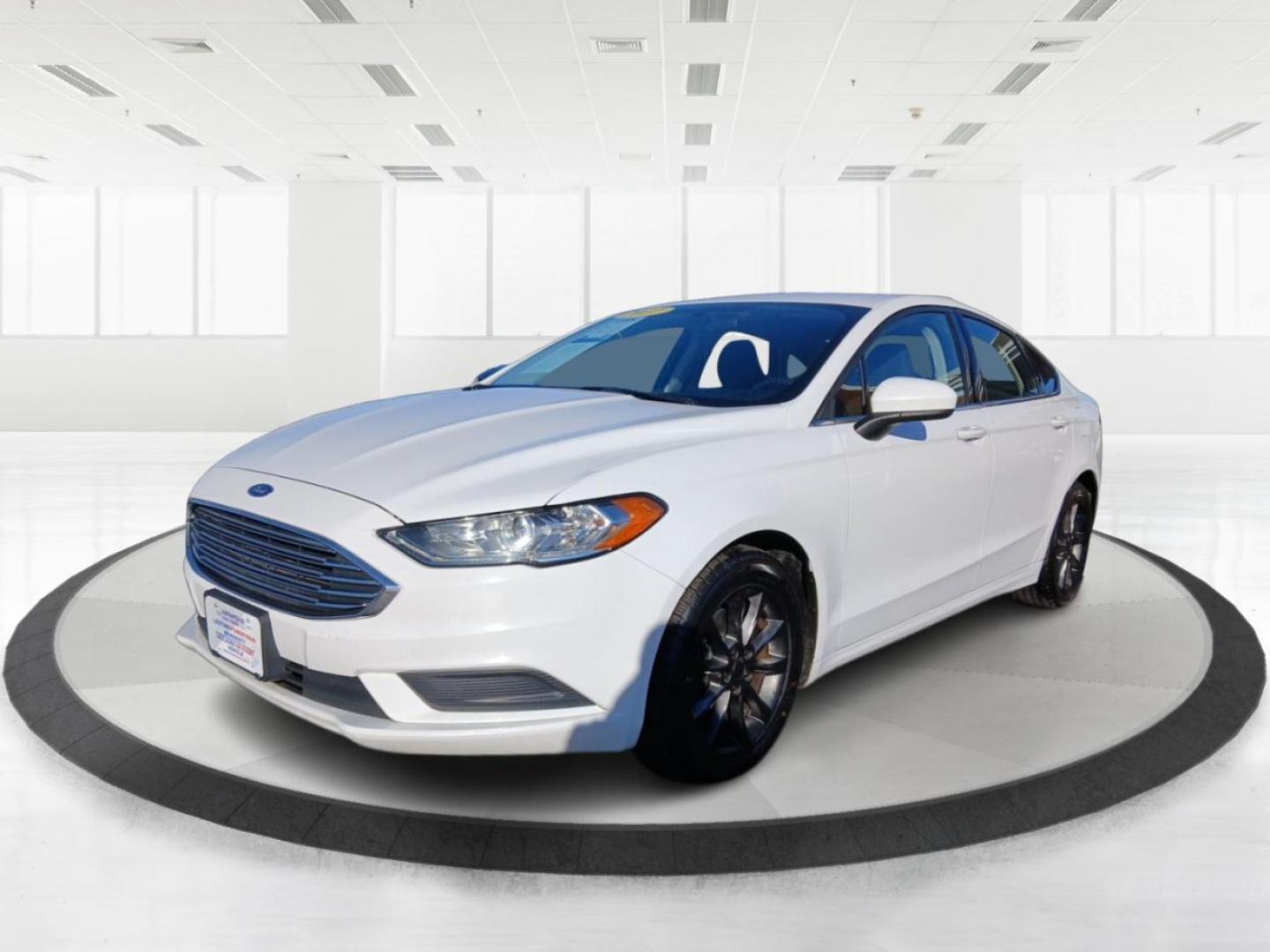 2017 Ford Fusion SE (3FA6P0H74HR) with an 2.5L L4 DOHC 16V engine, 6-Speed Automatic transmission, located at 1099 N County Rd 25A, Troy, OH, 45373, (937) 908-9800, 40.057079, -84.212883 - 2017 Ford Fusion SE - Photo#7