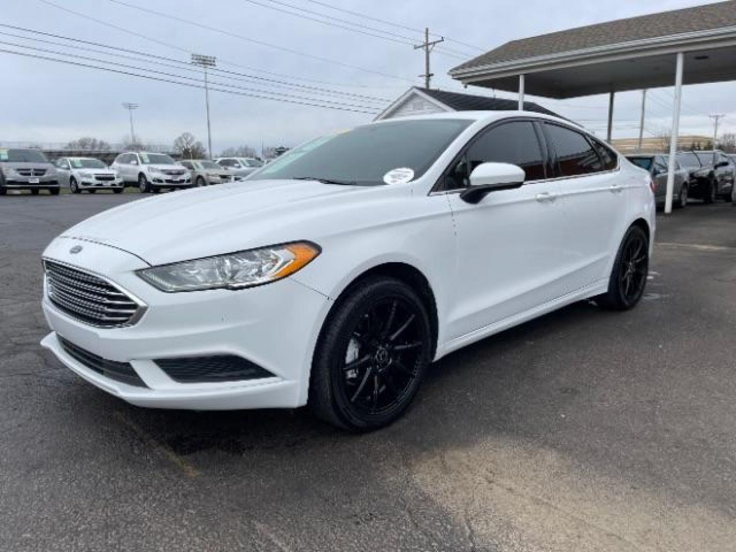 2017 White Gold Ford Fusion S (3FA6P0G7XHR) with an 2.5L L4 DOHC 16V engine, 6-Speed Automatic transmission, located at 1951 S Dayton Lakeview Rd., New Carlisle, OH, 45344, (937) 908-9800, 39.890999, -84.050255 - Photo#1