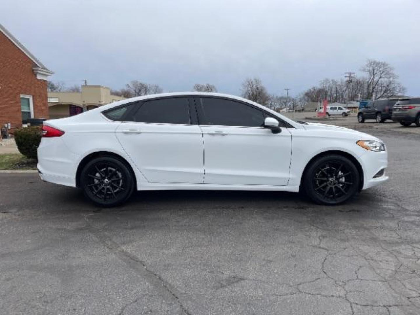 2017 White Gold Ford Fusion S (3FA6P0G7XHR) with an 2.5L L4 DOHC 16V engine, 6-Speed Automatic transmission, located at 1951 S Dayton Lakeview Rd., New Carlisle, OH, 45344, (937) 908-9800, 39.890999, -84.050255 - Photo#3