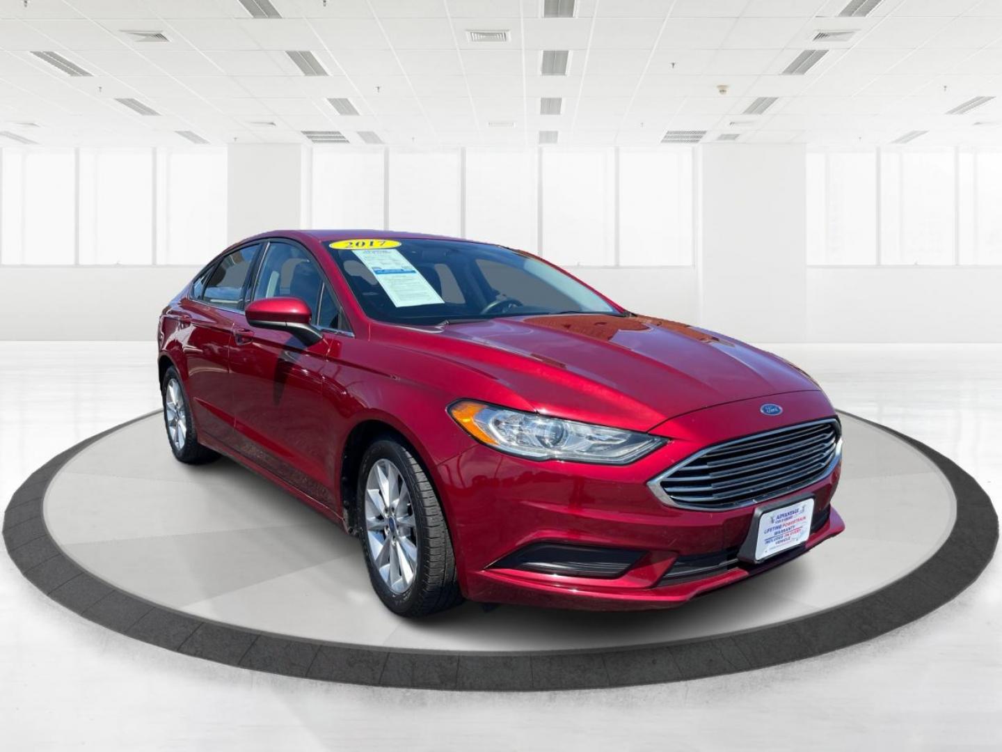 2017 Ruby Red Metallic Tinted Clearcoat Ford Fusion SE (3FA6P0H74HR) with an 2.5L L4 DOHC 16V engine, 6-Speed Automatic transmission, located at 1951 S Dayton Lakeview Rd., New Carlisle, OH, 45344, (937) 908-9800, 39.890999, -84.050255 - Photo#0