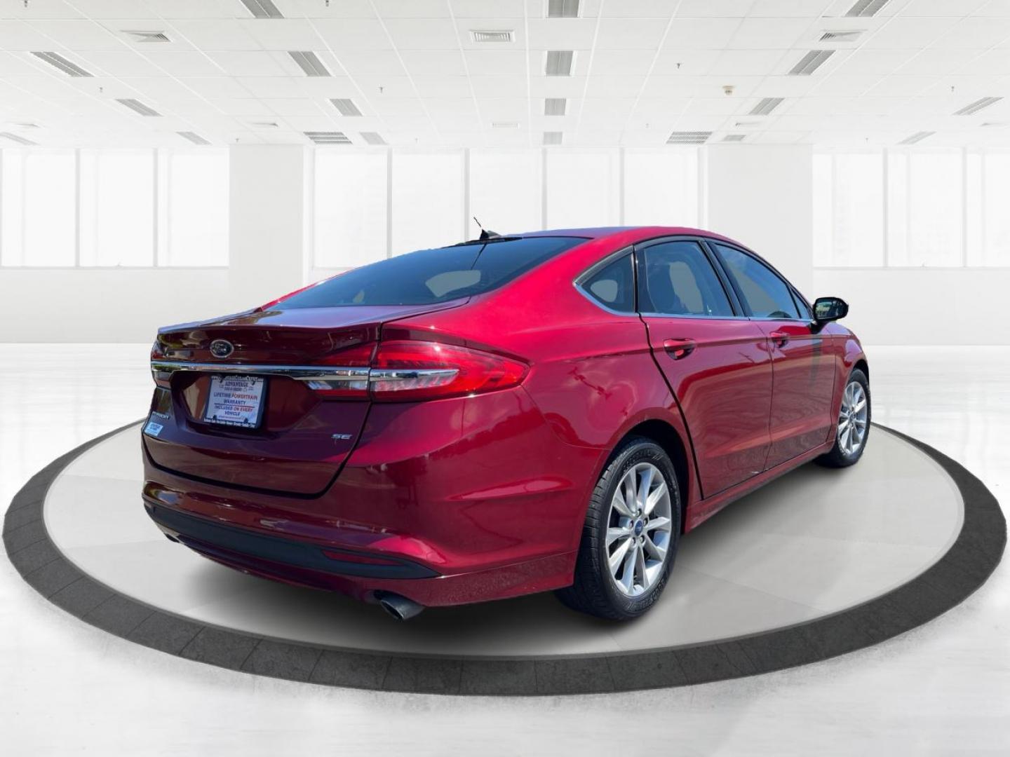 2017 Ruby Red Metallic Tinted Clearcoat Ford Fusion SE (3FA6P0H74HR) with an 2.5L L4 DOHC 16V engine, 6-Speed Automatic transmission, located at 1951 S Dayton Lakeview Rd., New Carlisle, OH, 45344, (937) 908-9800, 39.890999, -84.050255 - Photo#2