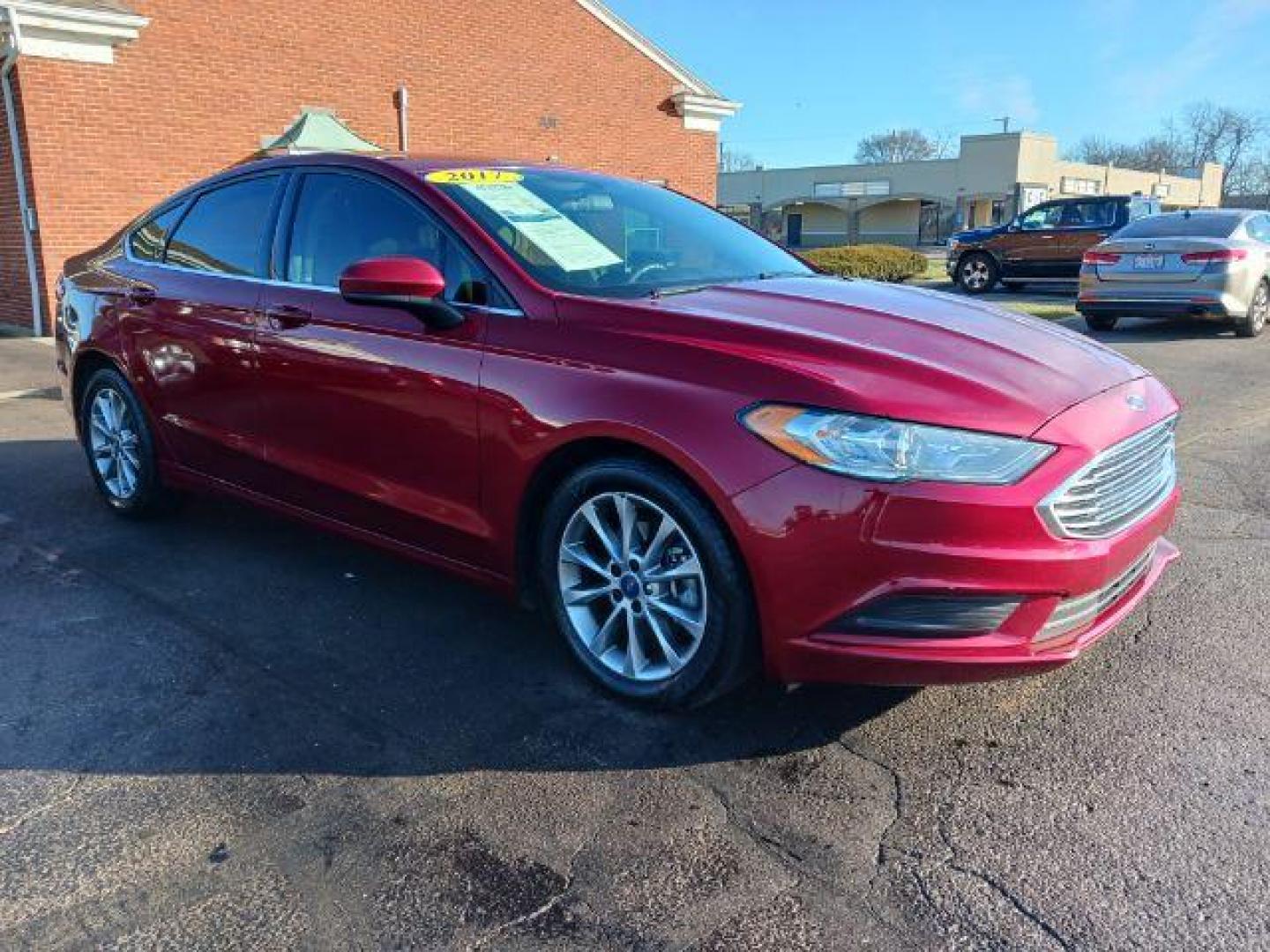 2017 Ruby Red Metallic Tinted Clearcoat Ford Fusion SE (3FA6P0H74HR) with an 2.5L L4 DOHC 16V engine, 6-Speed Automatic transmission, located at 1230 East Main St, Xenia, OH, 45385, (937) 908-9800, 39.687321, -83.910294 - Photo#0