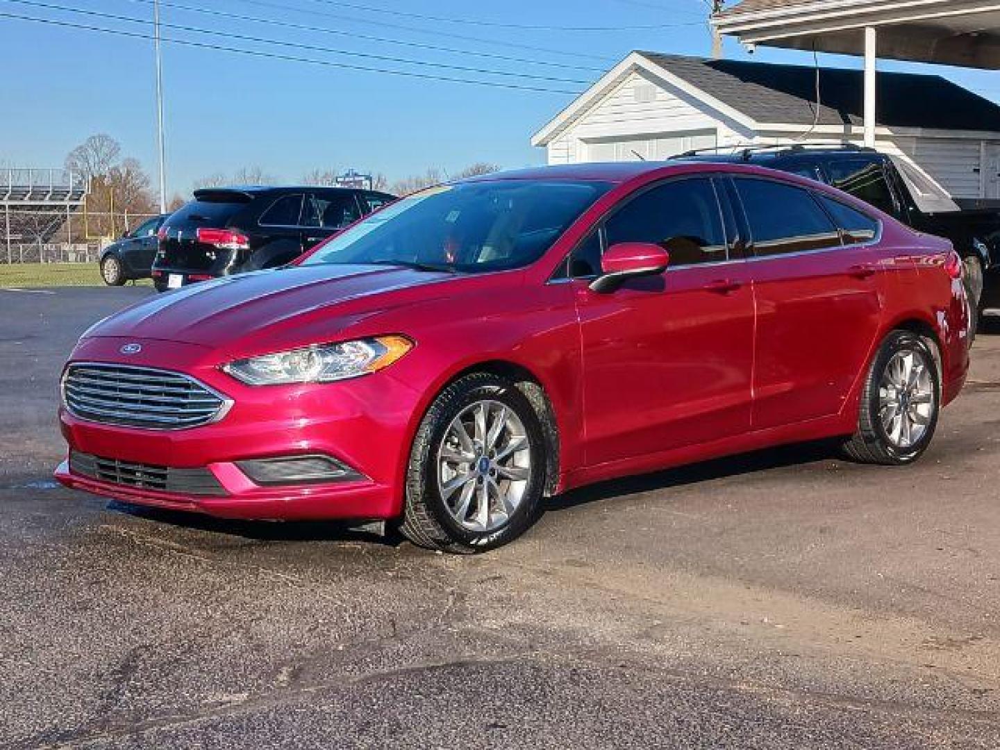 2017 Ruby Red Metallic Tinted Clearcoat Ford Fusion SE (3FA6P0H74HR) with an 2.5L L4 DOHC 16V engine, 6-Speed Automatic transmission, located at 1230 East Main St, Xenia, OH, 45385, (937) 908-9800, 39.687321, -83.910294 - Photo#2