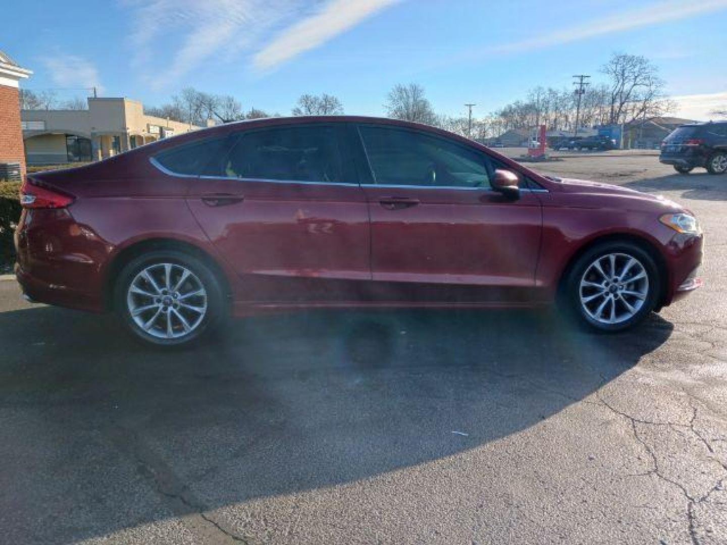 2017 Ruby Red Metallic Tinted Clearcoat Ford Fusion SE (3FA6P0H74HR) with an 2.5L L4 DOHC 16V engine, 6-Speed Automatic transmission, located at 1230 East Main St, Xenia, OH, 45385, (937) 908-9800, 39.687321, -83.910294 - Photo#4